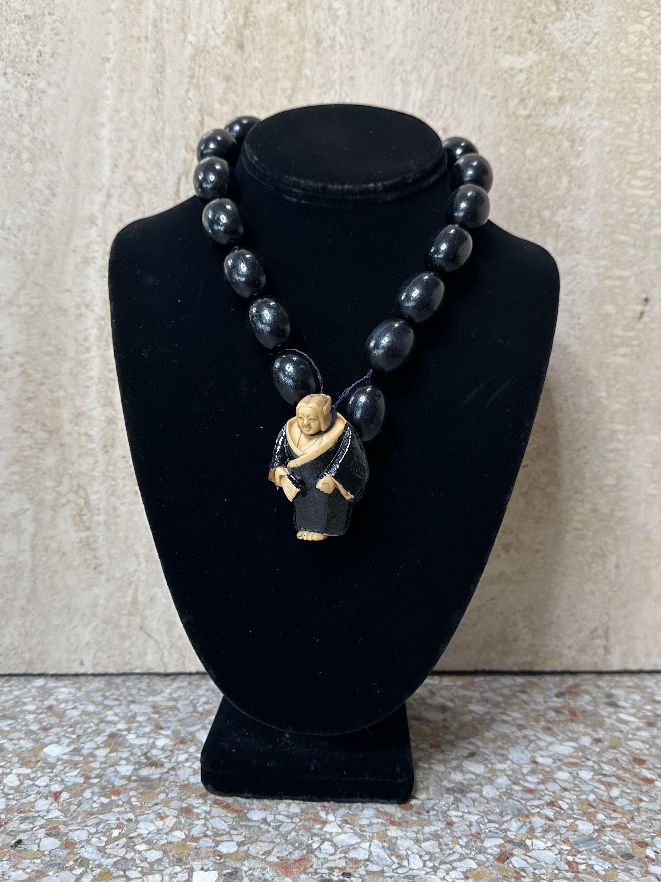 Vintage Carved Asian Female Buddha Necklace In Good Condition For Sale In Lake Worth Beach, FL