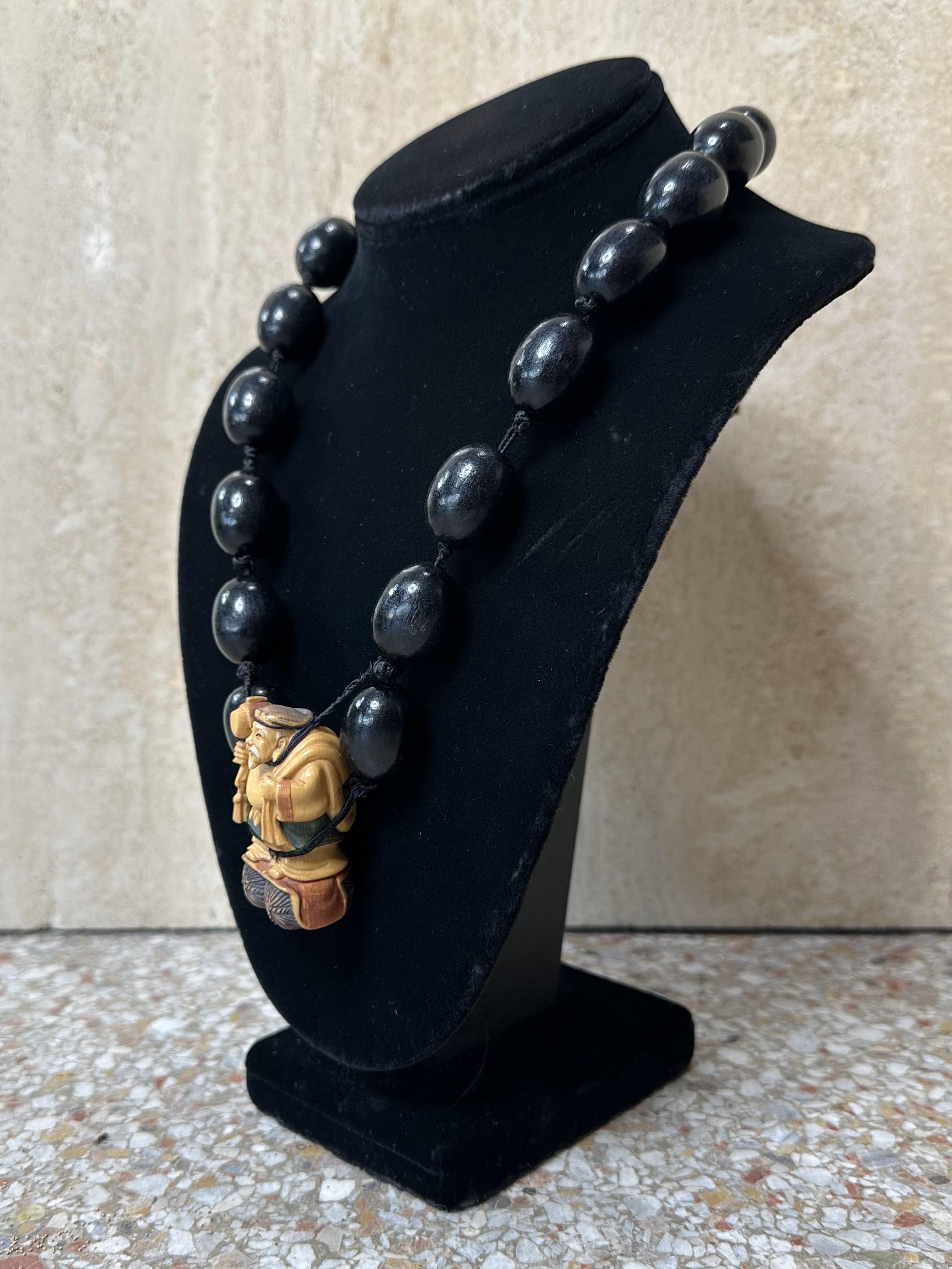 Vintage Carved Asian Male Buddha Rope Necklace In Good Condition For Sale In Lake Worth Beach, FL