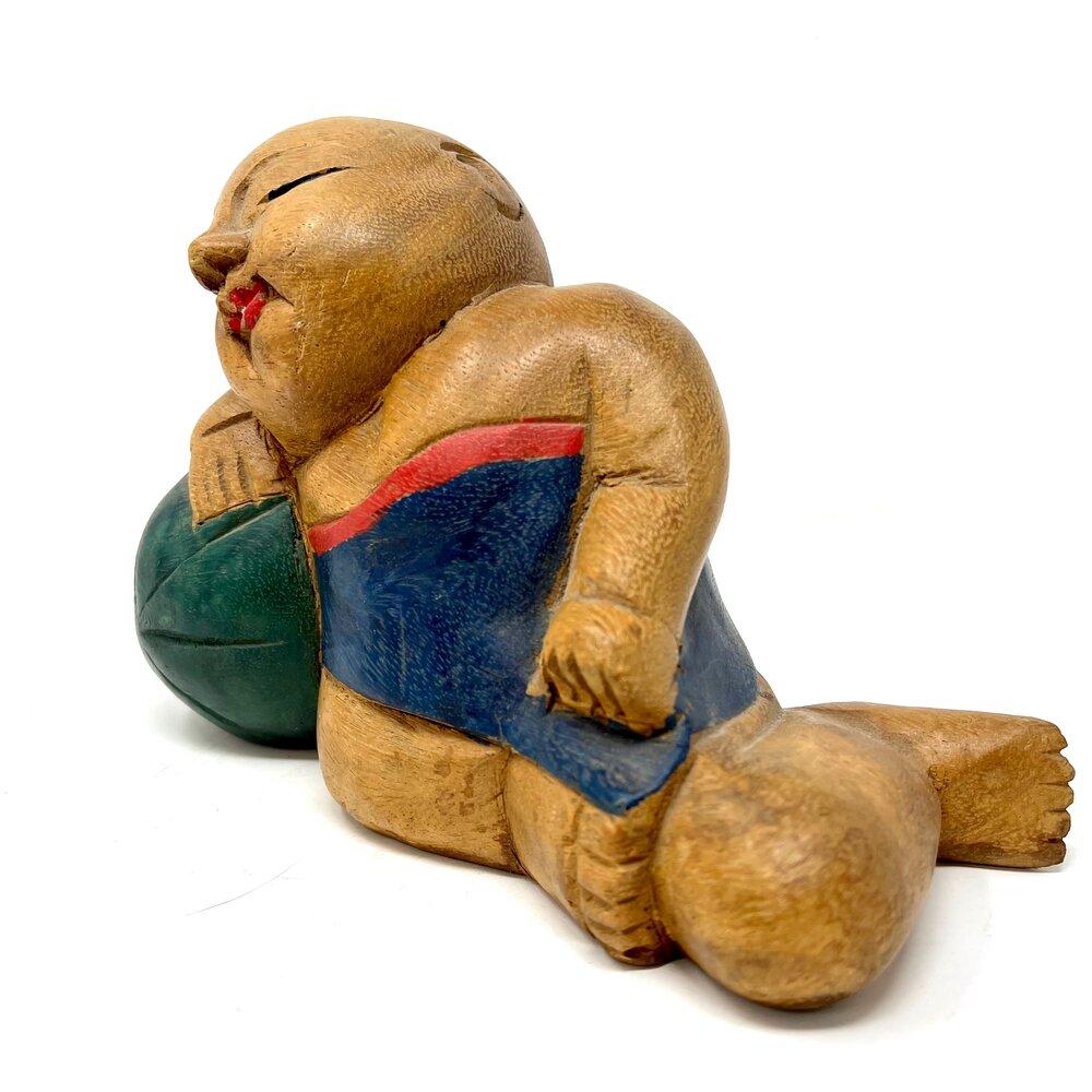 Vintage carved wooden Chinese “Good Luck” child sculpture. The piece is carved from wood and painted. In excellent vintage condition.

Measures: Width: 9 in / Depth: 4 in / Height: 6.5 in.