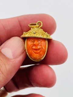 Vintage Carved Coral Faces Gold Pendant