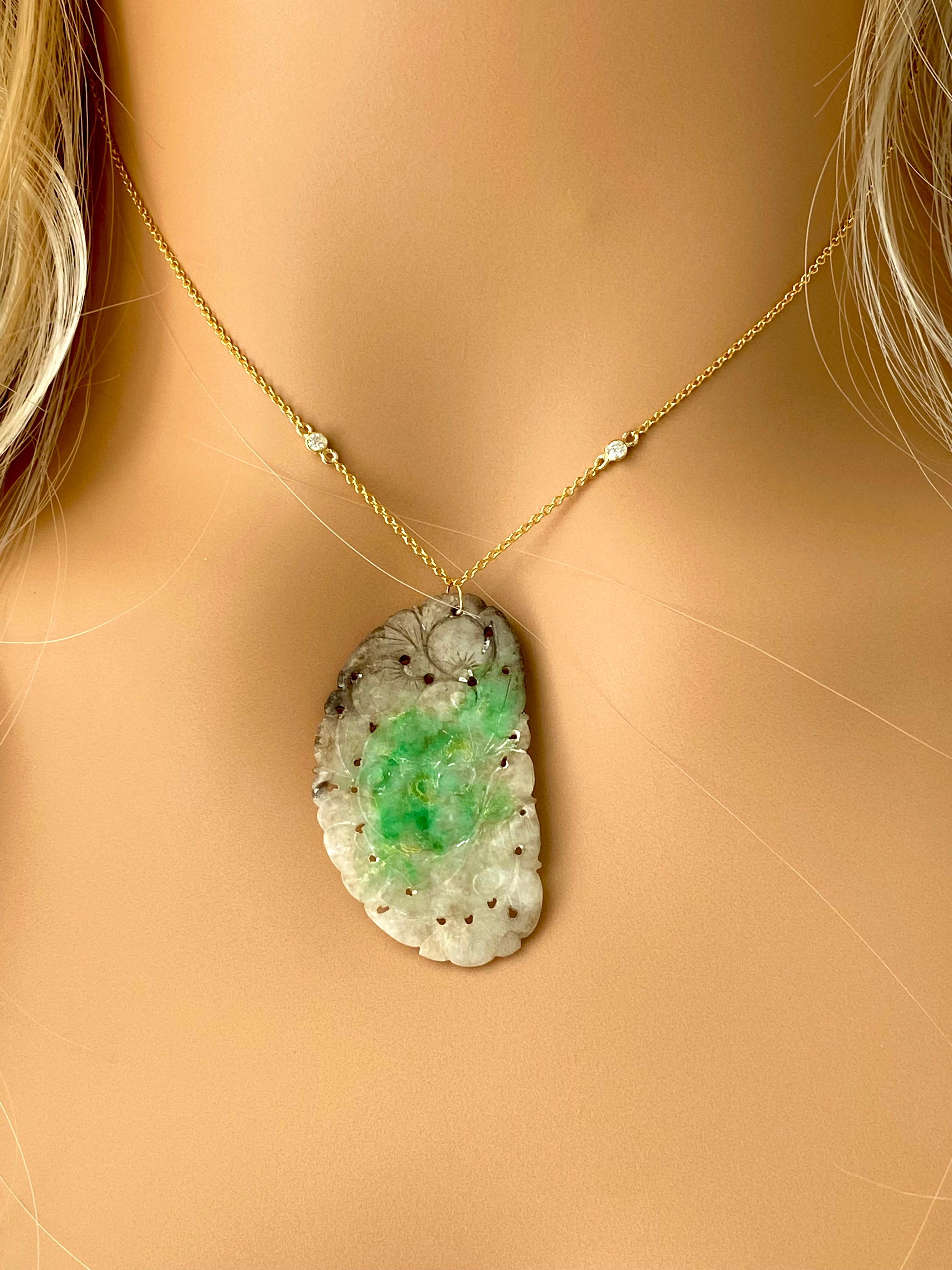 A vintage carved jade button pendant
Old Chinese natural apple jade carvings necklace pendant
Hand assembles and handmade into 14 Karat white and yellow gold diamond station necklace
The jade stones are carved in a light botanical pattern and are