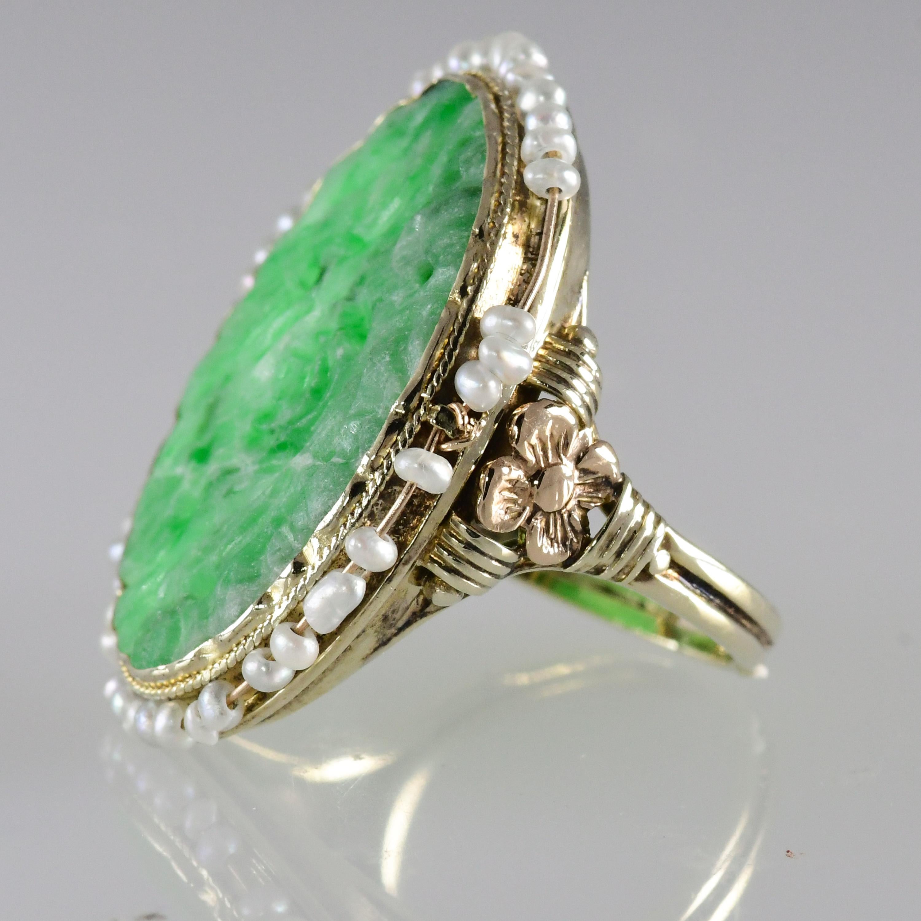 Art Deco Vintage Carved Jadeite Ring Encircled with Seed Pearls 14 Karat Yellow Gold For Sale