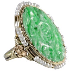 Vintage Carved Jadeite Ring Encircled with Seed Pearls 14 Karat Yellow Gold