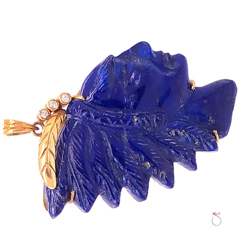 Beautifully carved Large Lapis Lazuli Indian Head pendant. This gorgeous pendant has a deep blue color with . The natural Lapis is carved in great details of an Indian Cheif Head. The carving is two pieces of lapis put together to complete the