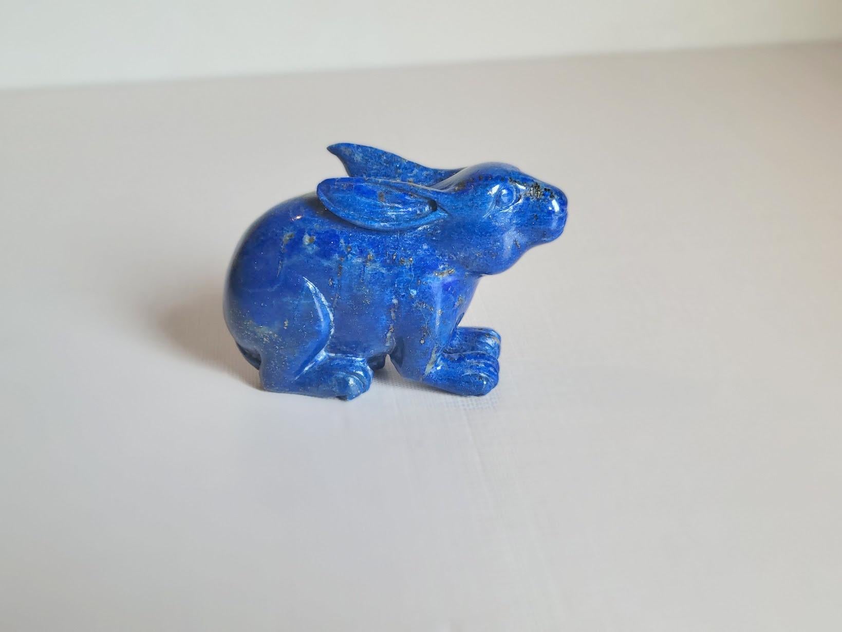 A stunning piece of accent decor handcrafted from the most beautiful natural royal lapis lazuli stone.

A wonderful rabbit carved from a single high-quality piece of lapis lazuli, with natural inclusions of golden pyrite. Amazing figurine!
The