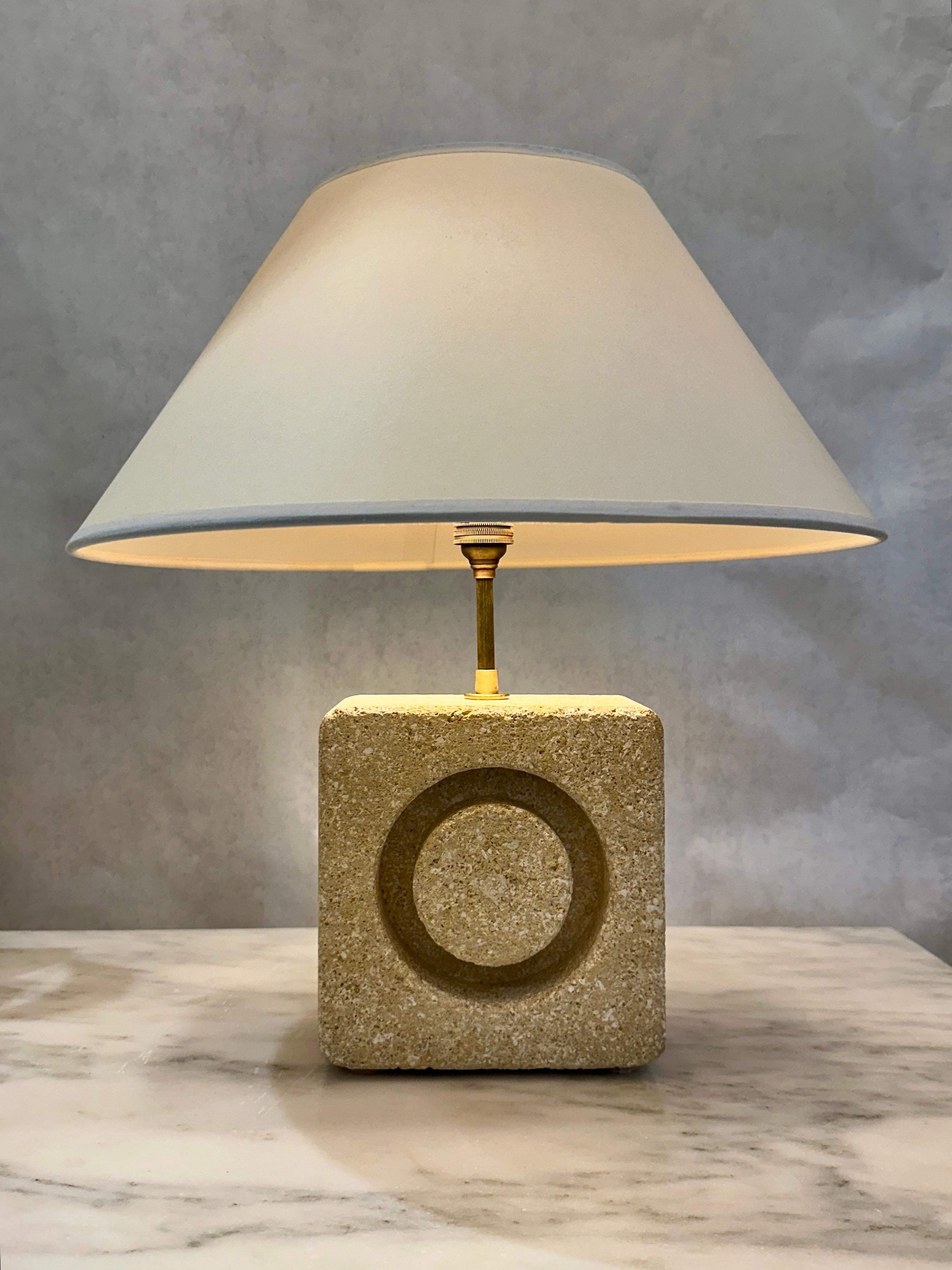 A smart geometric play of circle in square design, made from carved limestone and newly rewired with twisted silk cable.  NO shade included.  THIS ITEM IS LOCATED AND WILL SHIP FROM OUR MIAMI, FLORIDA SHOWROOM.