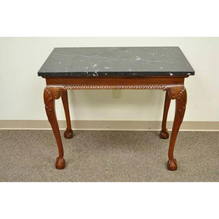 Vintage Carved Mahogany Chippendale Style Ball and Claw Marble Top Console Table (B). Item features a marble top, shapely legs with shell carved knees, ball and claw feet, rope carved front skirt, very nice vintage item. Circa late 20th Century.