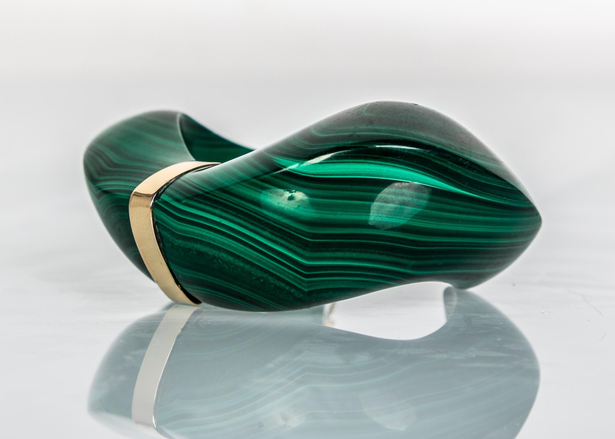 Malachite is an unmistakable stone known for its hallmark green color and signature natural striations. Notwithstanding its impeccable beauty, malachite for centuries has been thought to have protective qualities and is even said to foretell wealth.