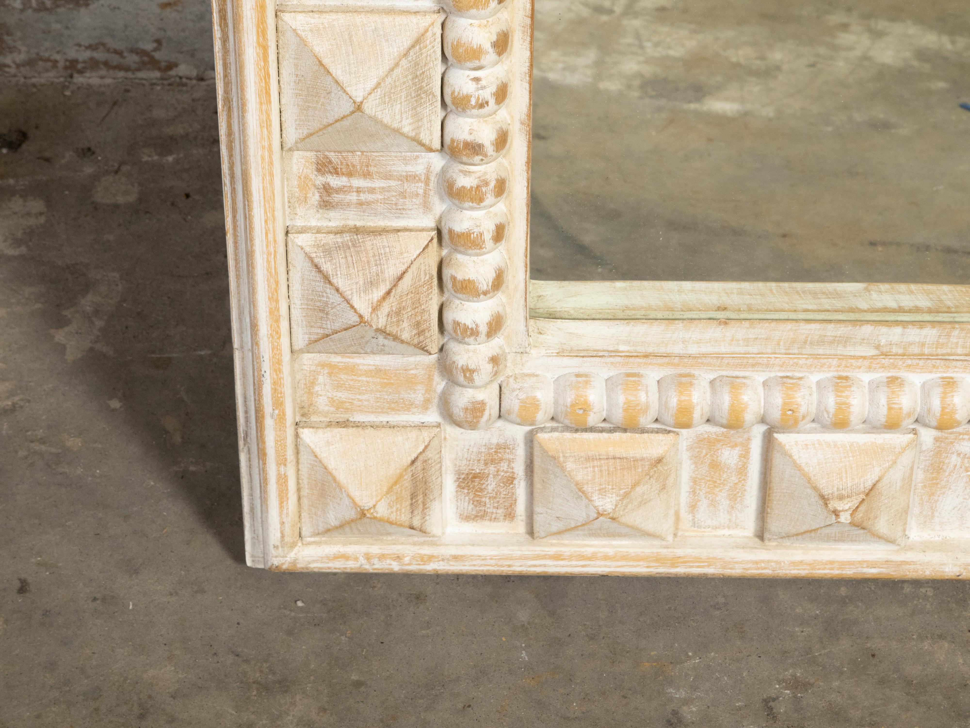 Wood Vintage Carved Mirror with Raised Diamond Motifs, Large Beads and Scraped Finish For Sale