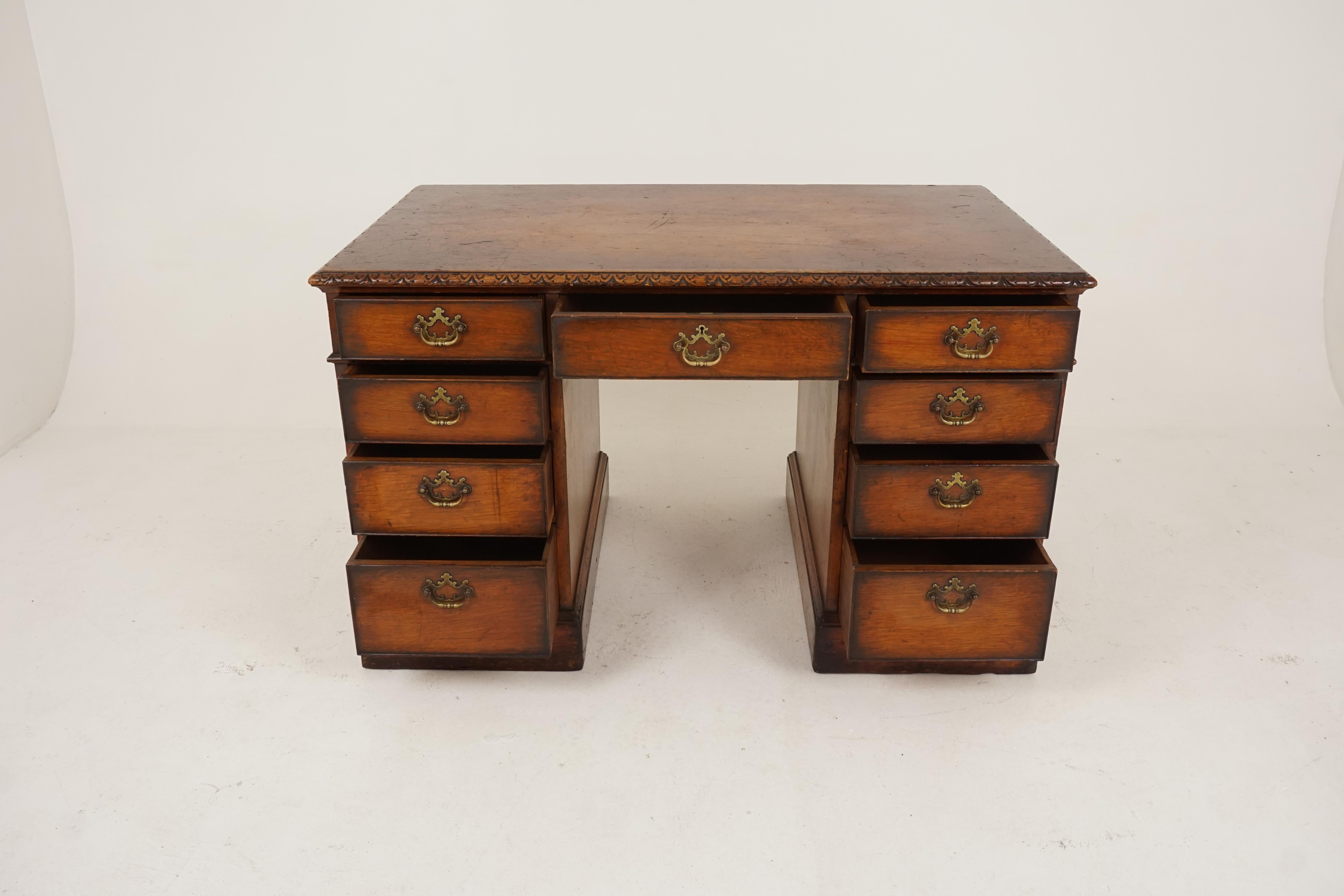 Vintage carved oak double pedestal desk, Scotland 1930, B2319

Scotland 1930
Solid oak
Original finish
Rectangular top with carved edging
Central pull-out drawer
Flanked by a pair of pedestals each having four graduating drawers
All original