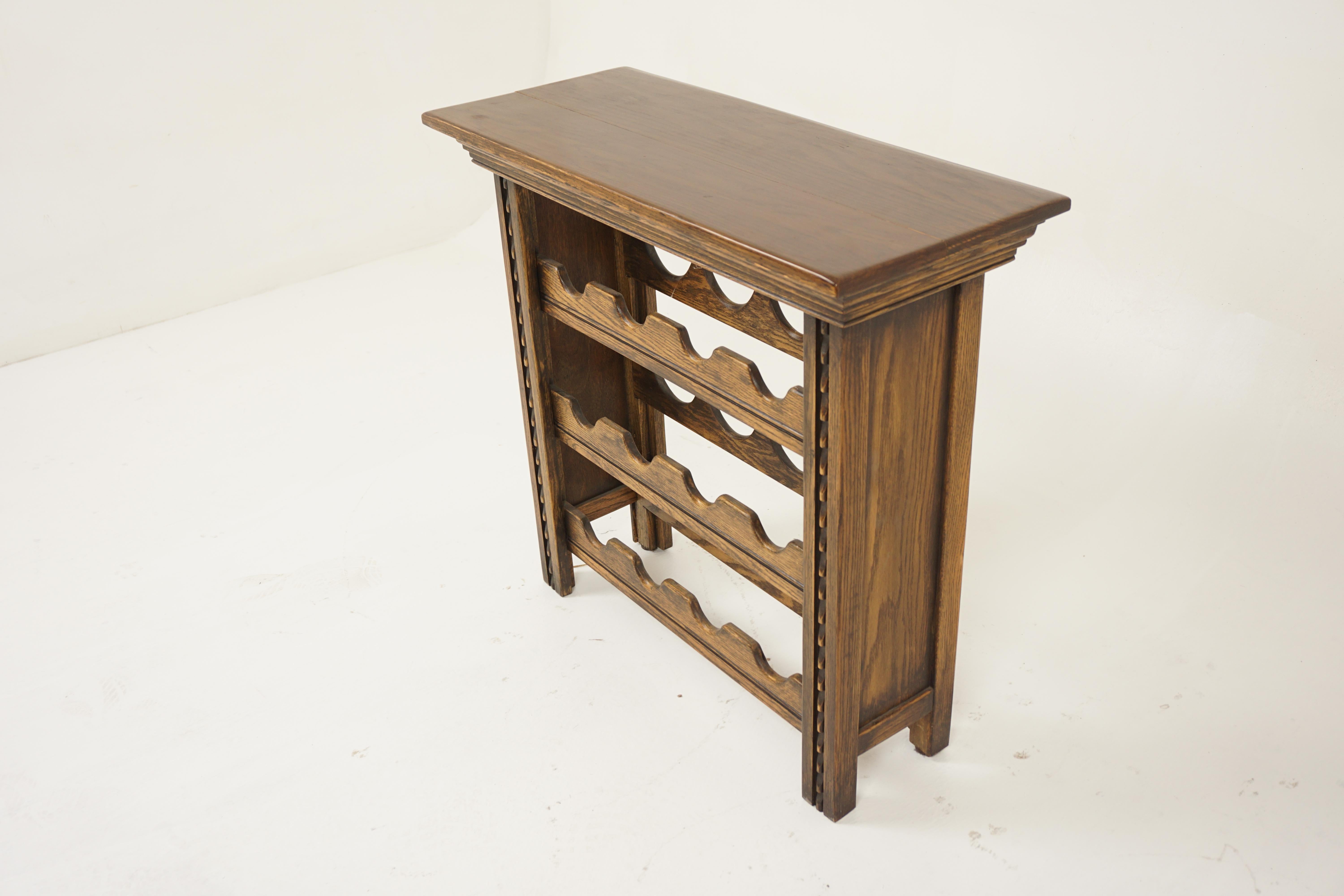 Vintage Carved Oak Free Standing Wine Rack, Canada 1960, H1156

Solid Oak
Original finish
Rectangular moulded top\Four carved supports on each end with solid panels
Three shaped bottle holders in the center
Very good condition
All solid

30