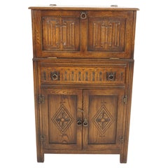 Cocktailschrank aus geschnitzter Eiche und Leinen mit gefaltetem Eichenholz, Barschrank, Schottland 1940, H115