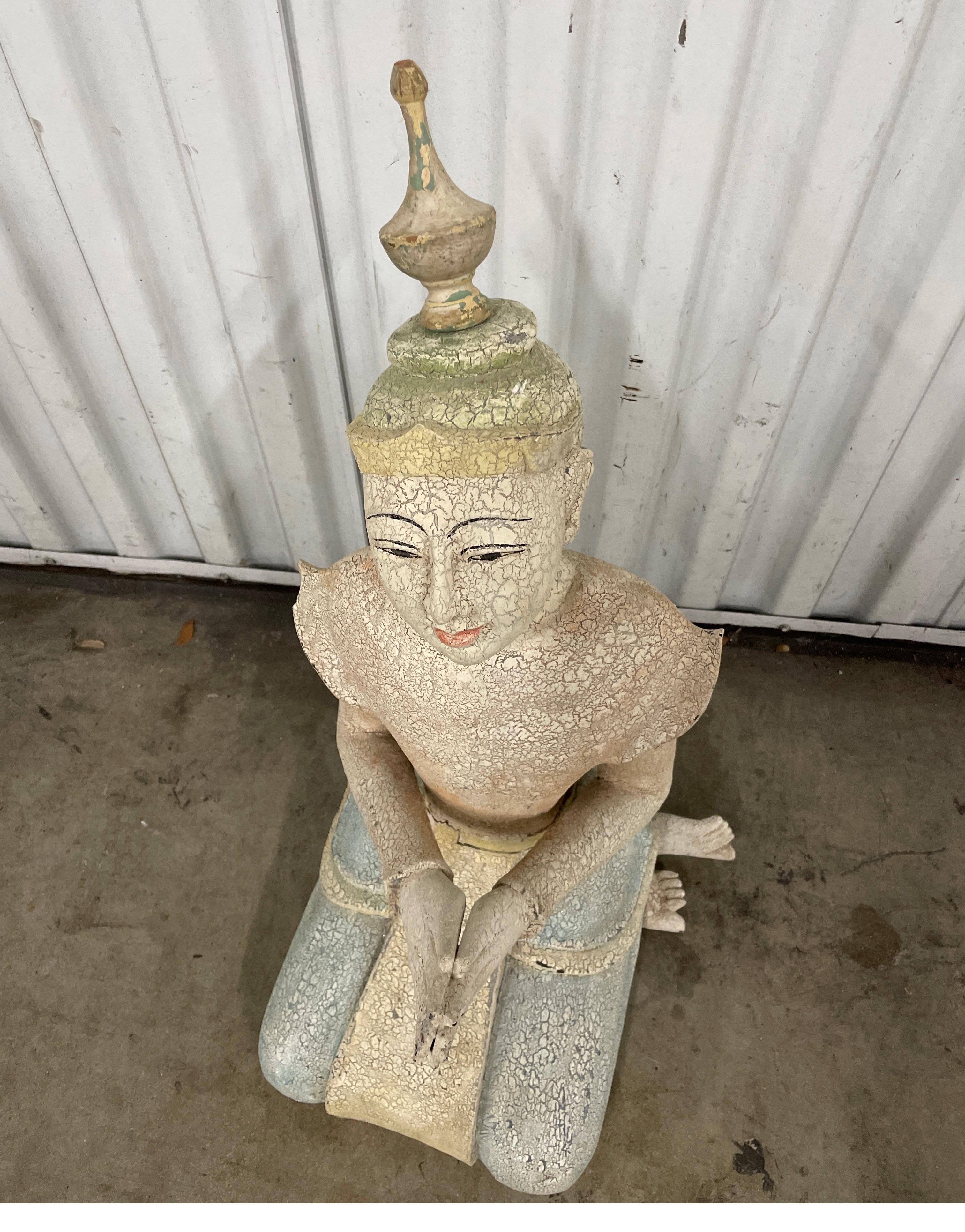 Vintage hand carved and painted seated deity. Very nice details and pastel colorations.