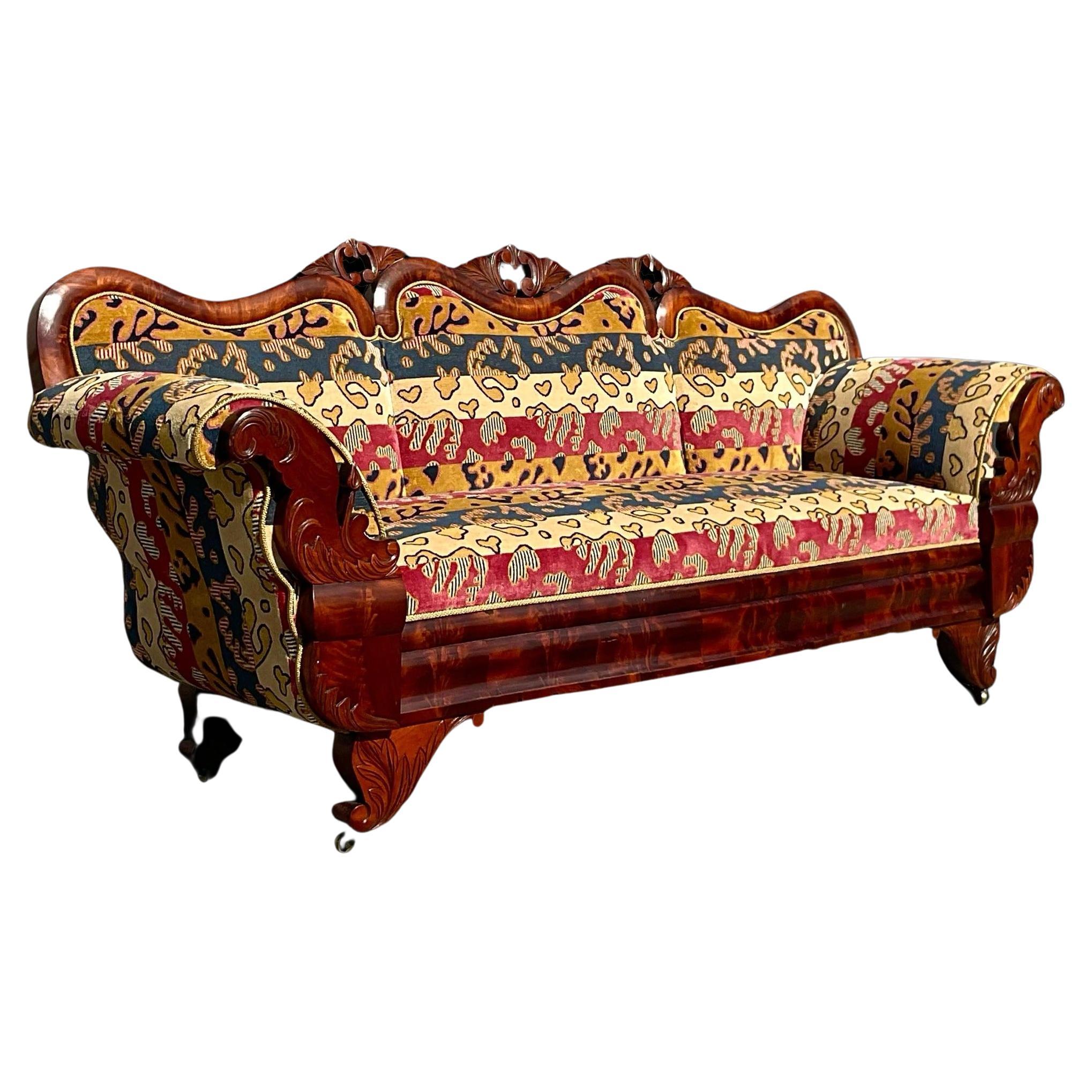 Vintage Carved Rococo Clarence House Flame Sofa For Sale