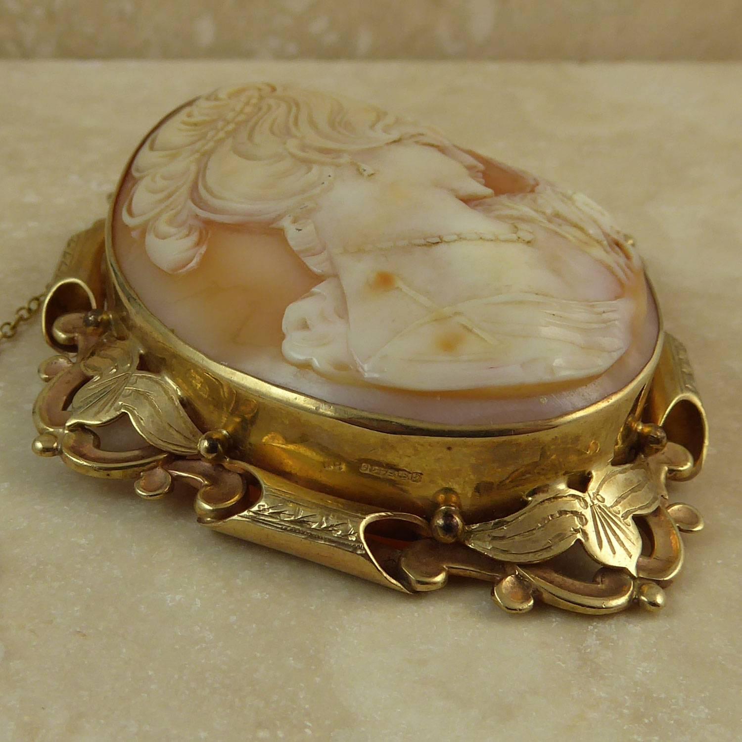 cameo gold brooch