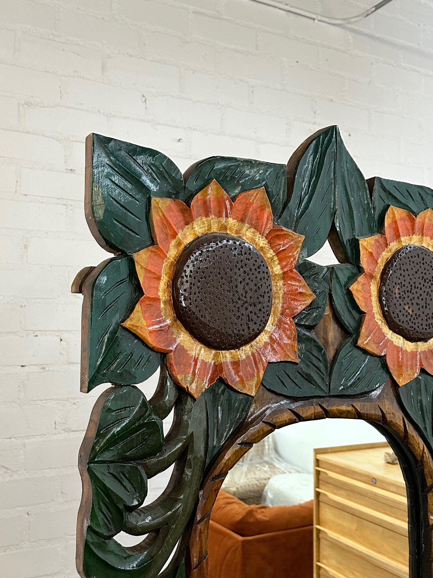 W33 H82 D20.5 
Large floor mirror with sunflower detailed carvings. Item is structurally sound and sturdy. Item features a newly cut glass. Floor mirror has no major areas of wear.
