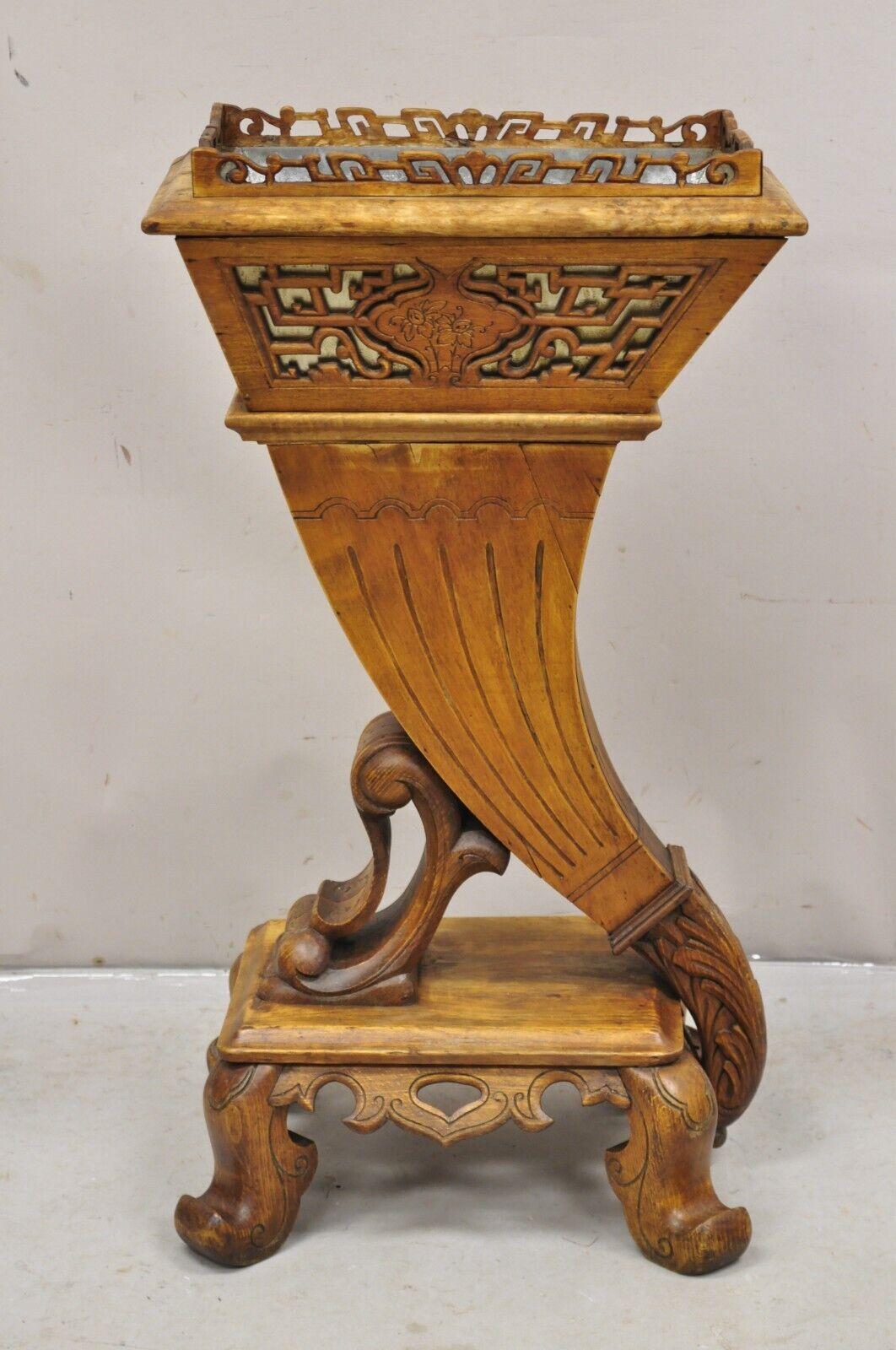 Vintage Carved Teak Wood Fretwork Figural Cornucopia Chinese Plant Stand Planter with Zinc Metal Liner. Circa Mid to Late 20th Century. Measurements: 35.5