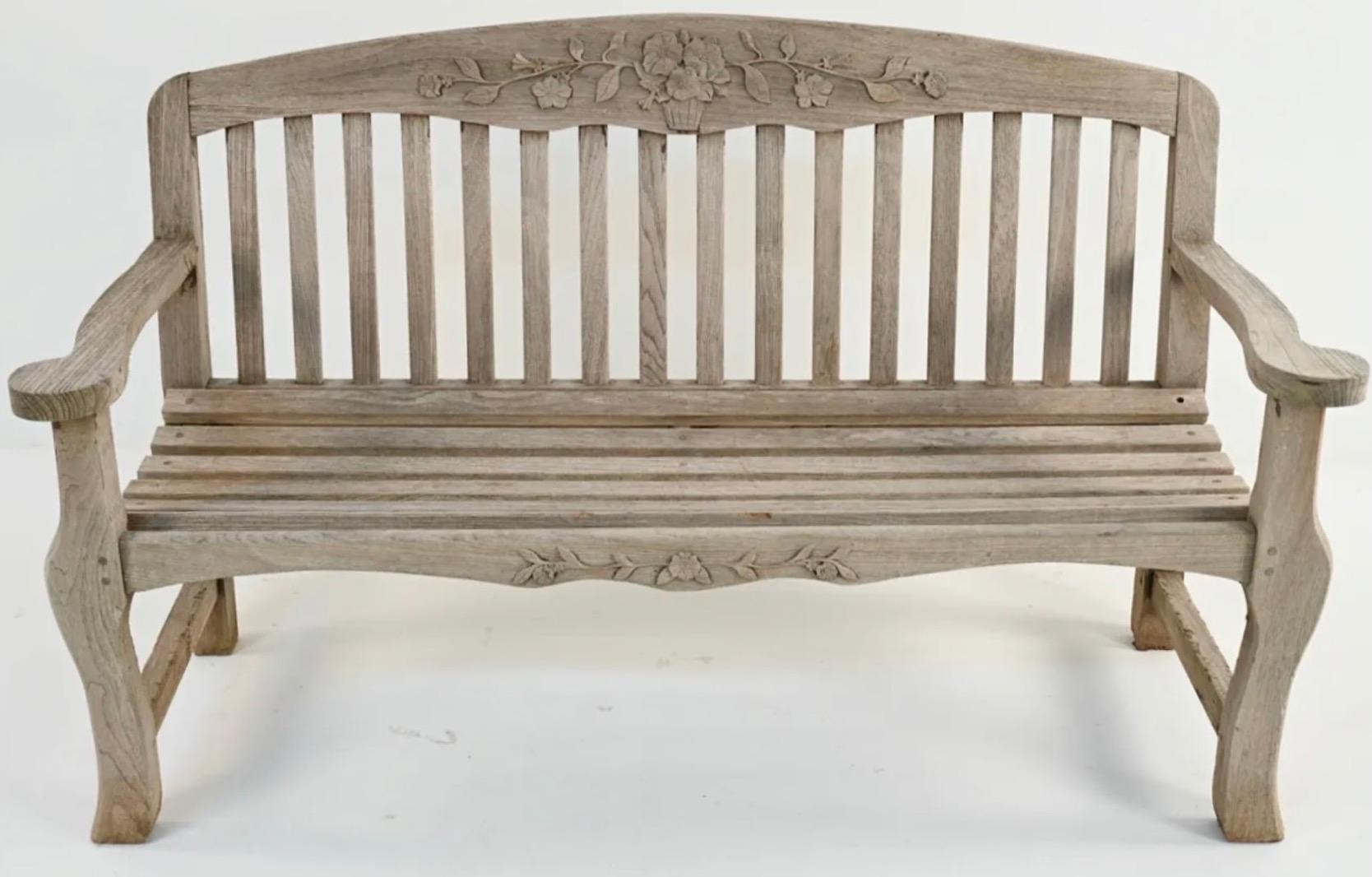 Add style and comfort to your outdoor seating with this beautifully carved settee or sofa bench with cabriole legs. 
Labeled Kinsley Bates on right side of seat.