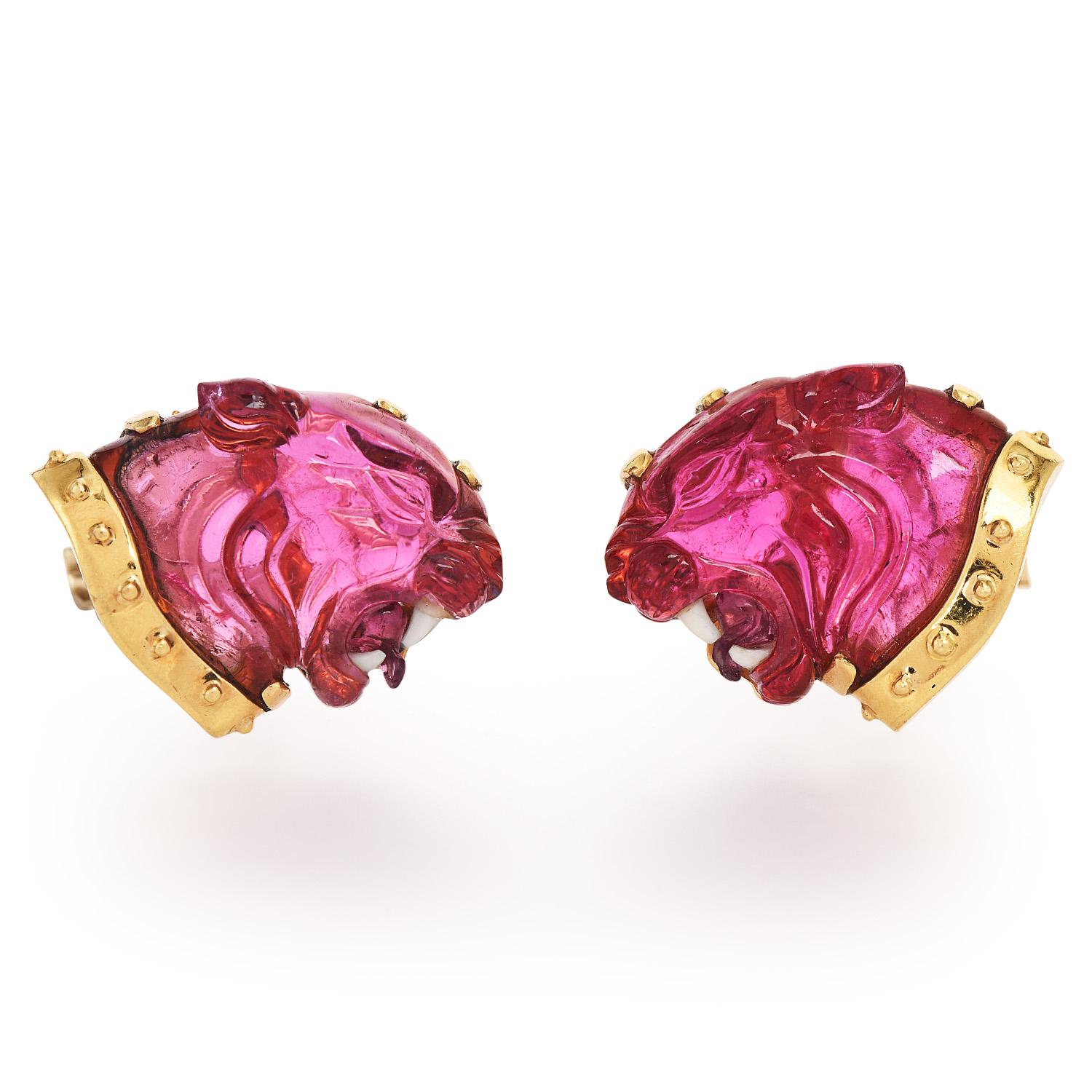 Strong & powerful, these vintage cufflinks are made for a unique person.

Are crafted in solid 18K yellow gold.

With two High Quality, Carved Cougar-head Pink tourmaline, carved stones weighing approx.22 carats and measuring  18 mm x 17 mm x