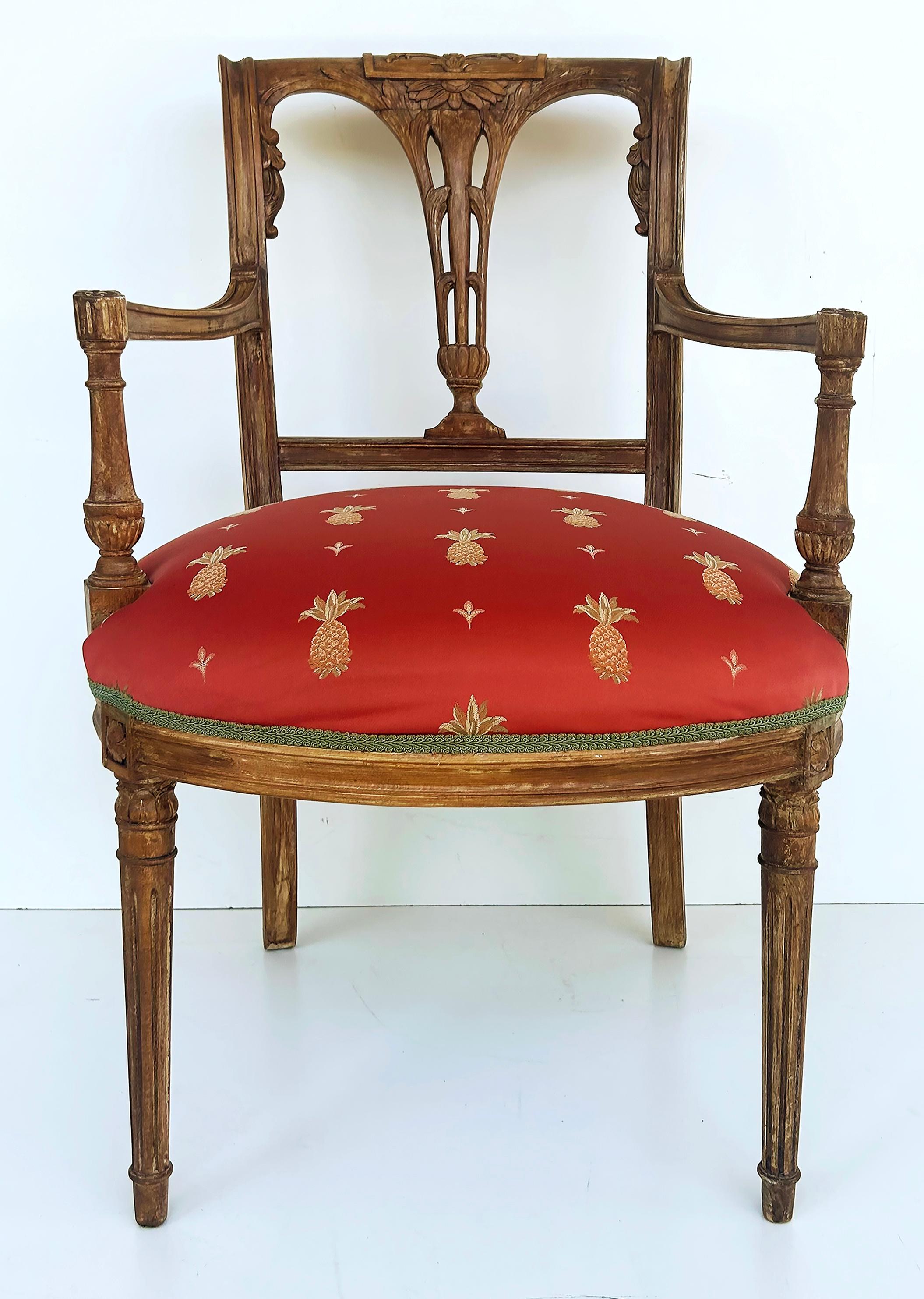 Antique Carved Venetian Plastered Wood Armchairs with Pineapple Seats

Offered for sale is a pair of early 20th-century carved wood armchairs with custom Venetian plaster finishes that give them a wonderful Old World look. The chair seats have been