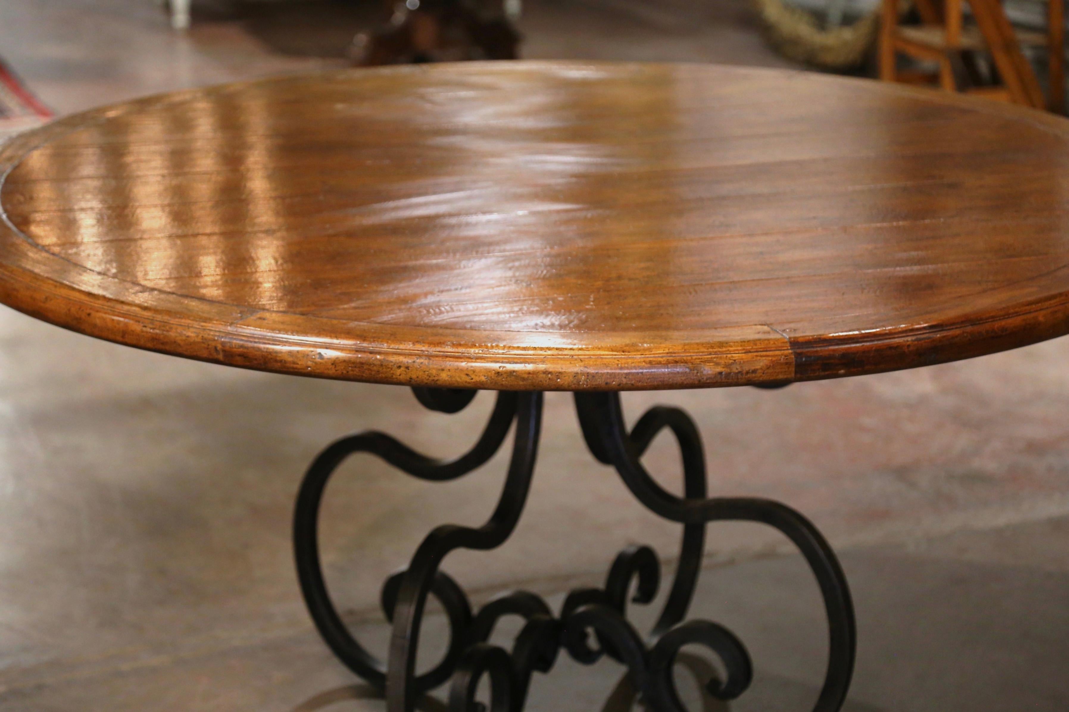 American Vintage Carved Walnut Round Dining Table on Four-Leg Wrought Iron Base For Sale