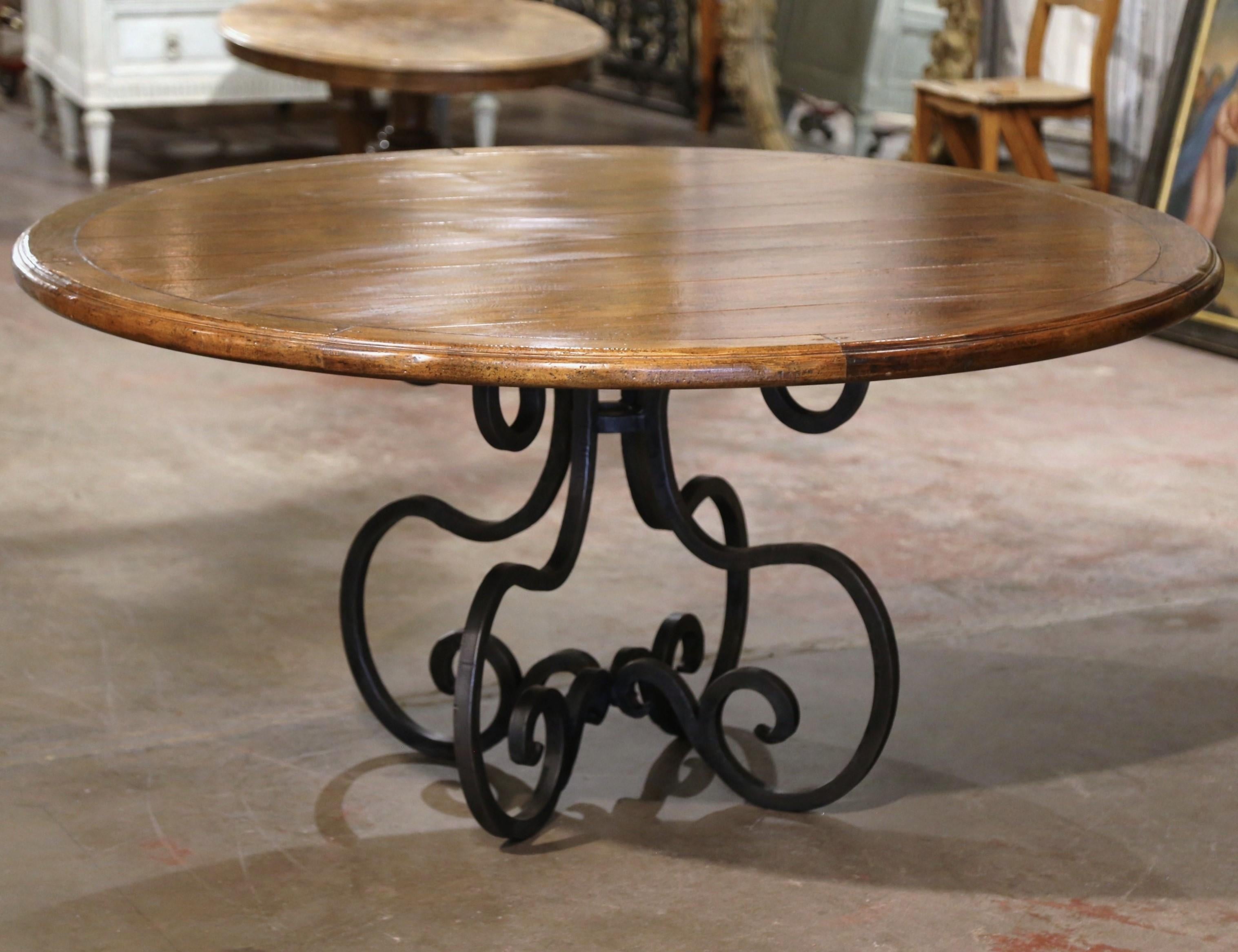 Vintage Carved Walnut Round Dining Table on Four-Leg Wrought Iron Base In Excellent Condition For Sale In Dallas, TX
