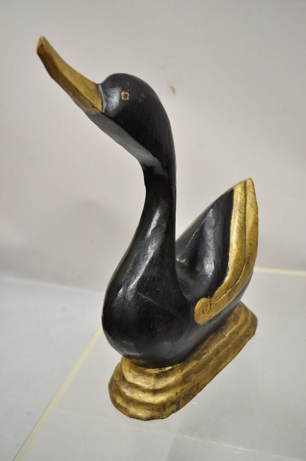 20th Century Vintage Carved Wood Art Deco Style Black Gold Duck Goose Figures, a Pair