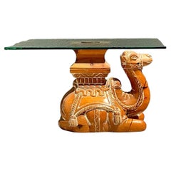 Table vintage en verre et bois sculpté en forme de chameau