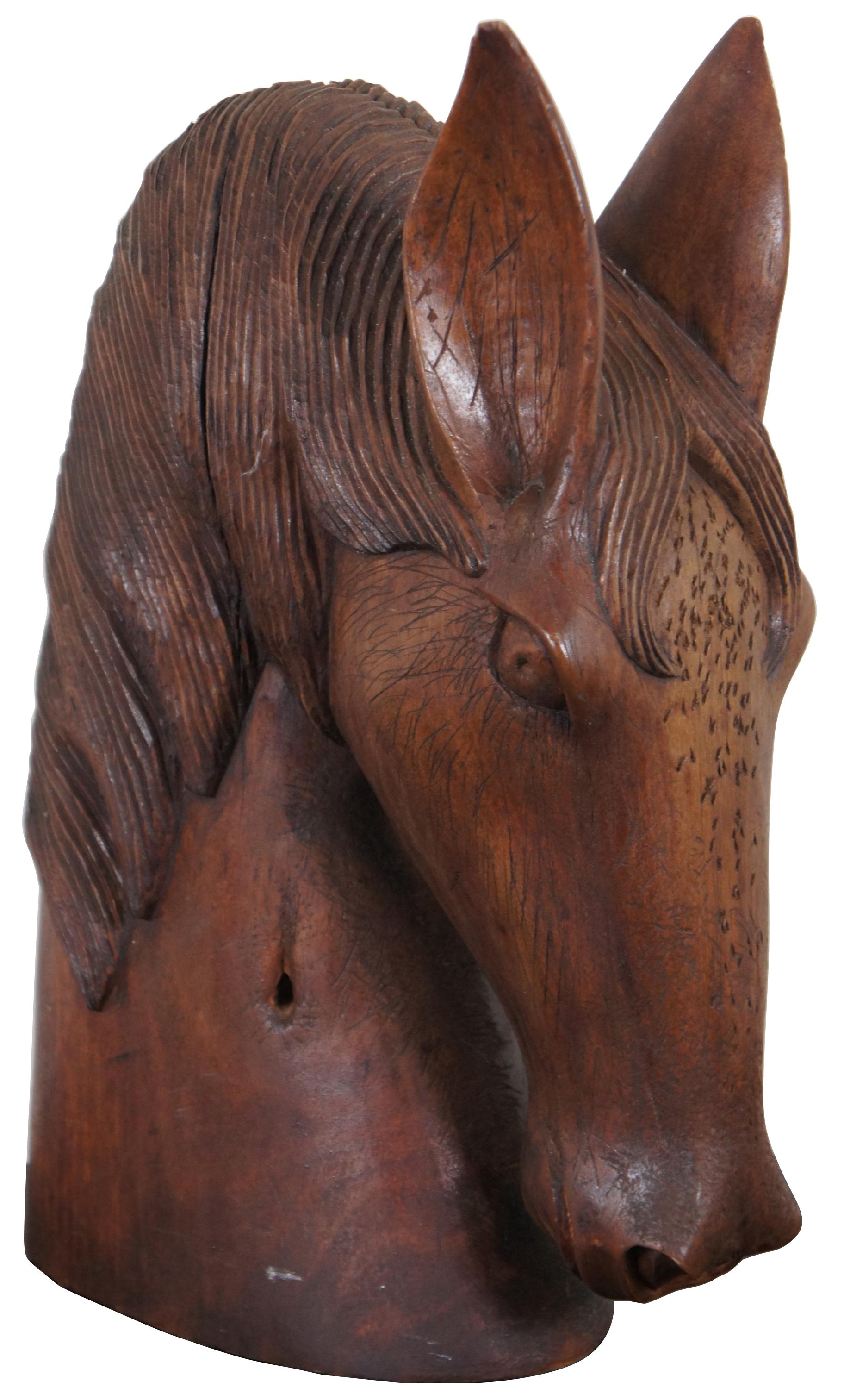Vintage carved wood horse head bust.
  