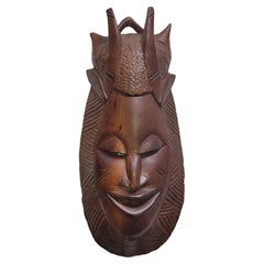 Maschera vintage in legno intagliato, arte popolare africana del XX secolo