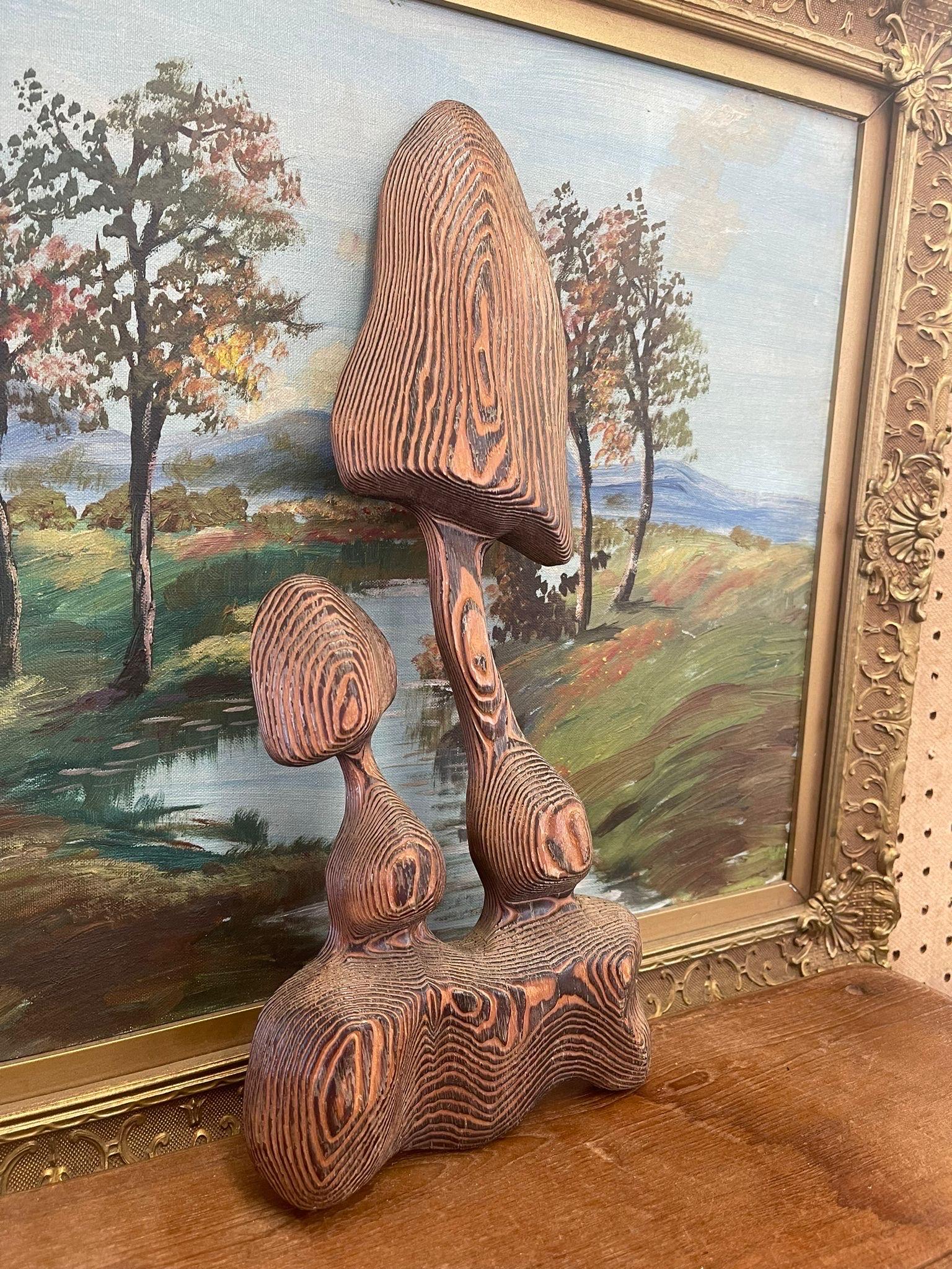 This Hand carved mushroom wall Art has stunning wood grain. Hook attached to the back ready to be hung up. Vintage condition consistent with age as Pictured.

Dimensions. 7 W ; 2 D ; 16 H