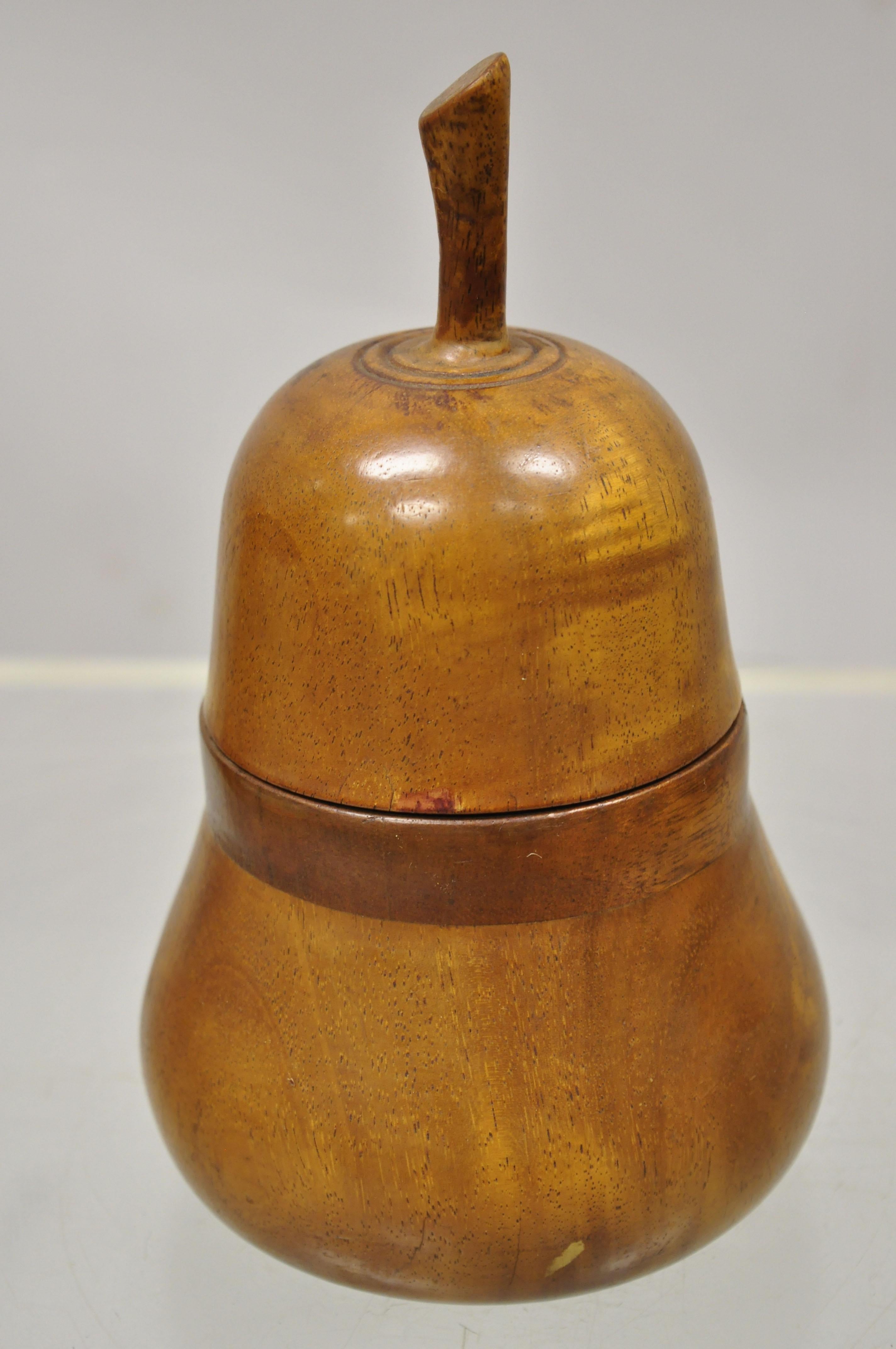 Small Vintage carved wood pear shaped mahogany tea caddy Folk Art Regency desk box. Circa mid to late 20th century. Measurements: 8