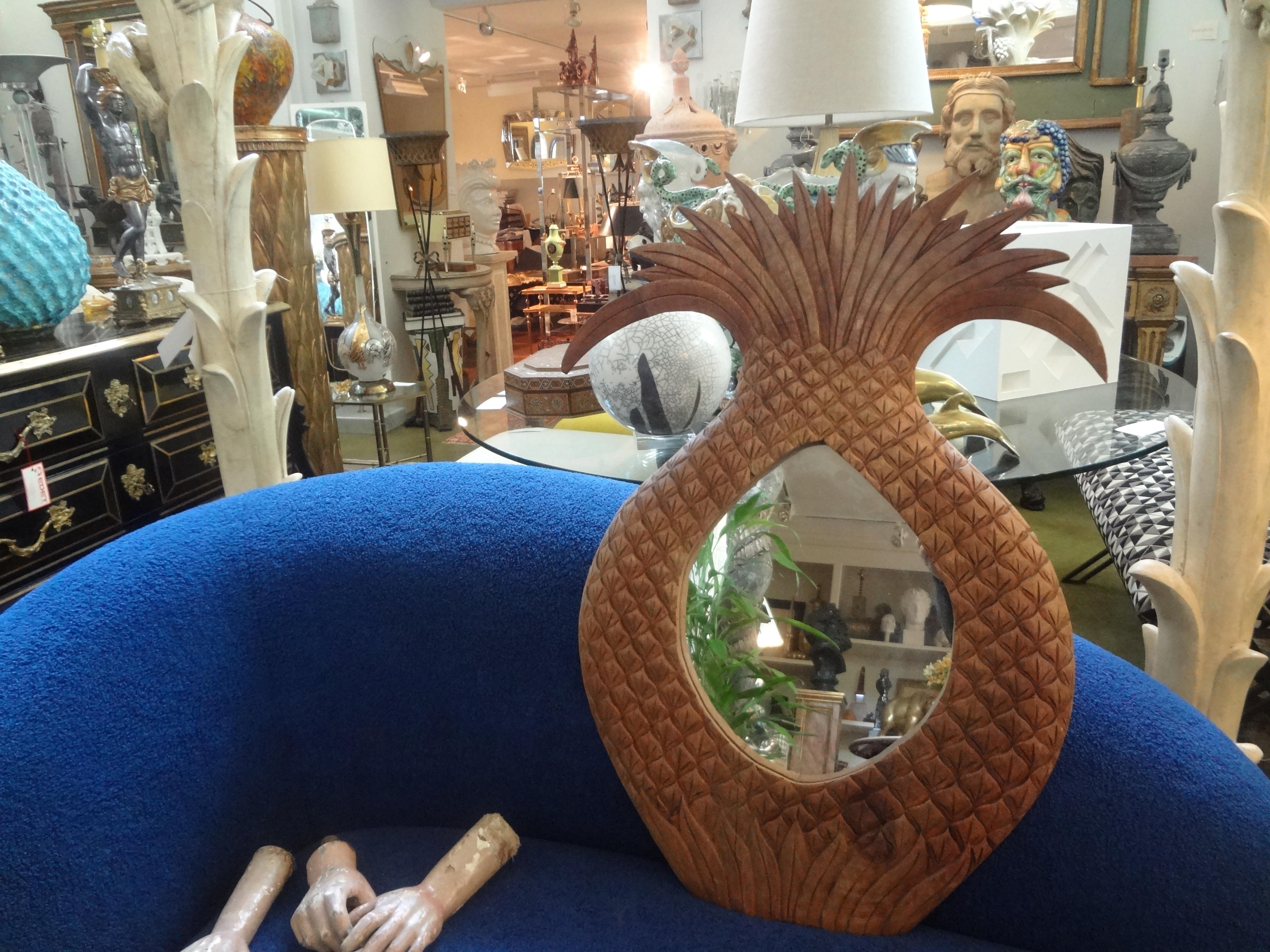 Vintage carved wood pineapple mirror.
Our unusual Hollywood Regency pineapple form mirror is expertly carved to look like a real pineapple. Perfect size for a powder room or dressing room.
Fabulous!!!
