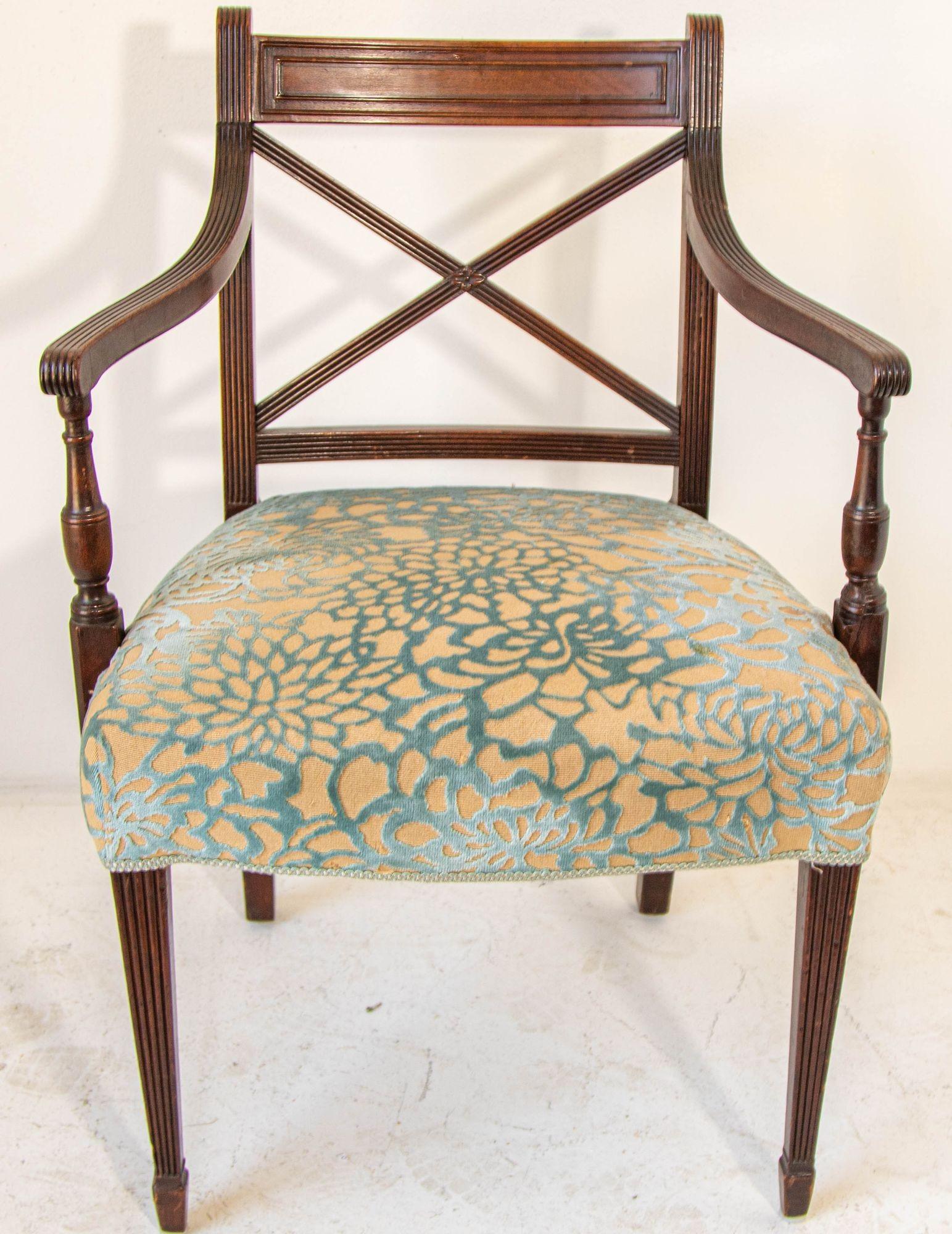 Vintage Hollywood Regency English Style Hand Carved Wood Side Chair. 
Side Chair in walnut stained solid wood, wooden rolled arms and flared back legs.
Cushion seat with foamed base for comfort and style. 
This accent arm chair body surround is