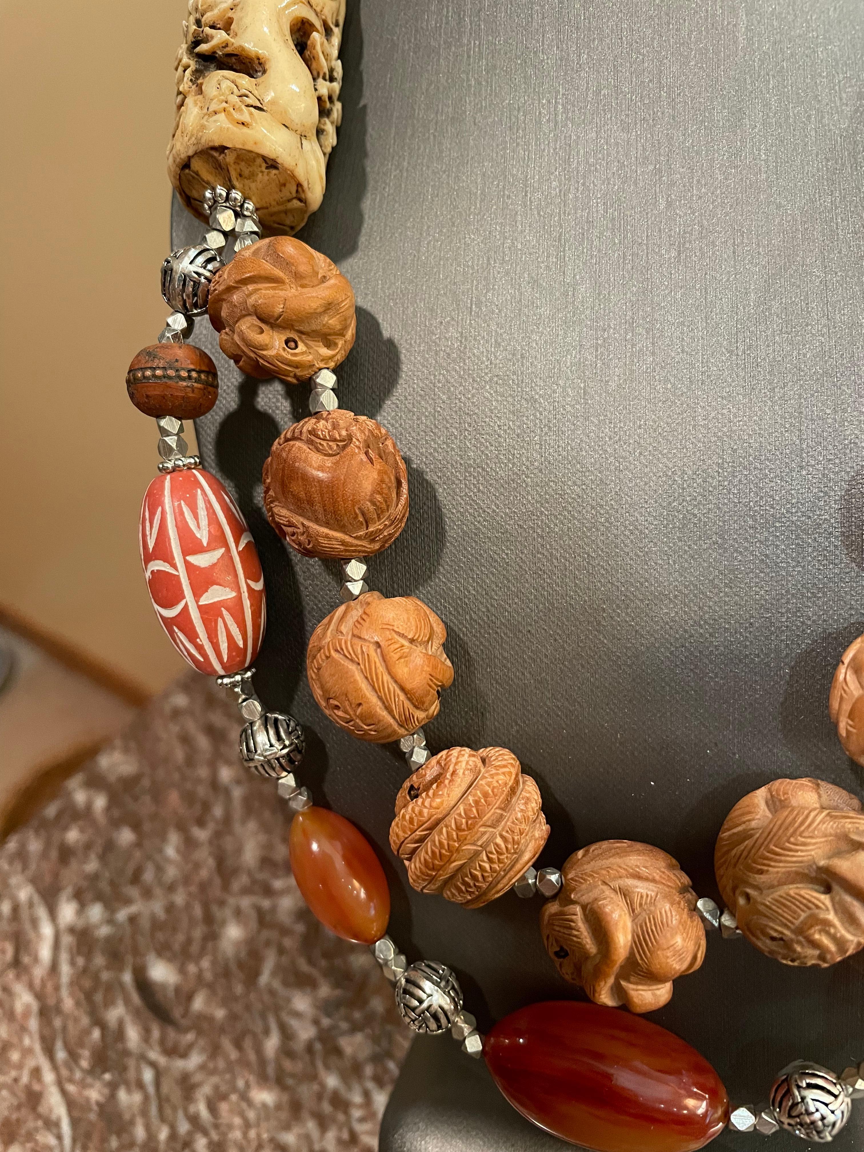Vintage carved wooden Chinese beads, Bakelite, soapstone barrels, OOAK necklace. In Good Condition For Sale In Pittsburgh, PA