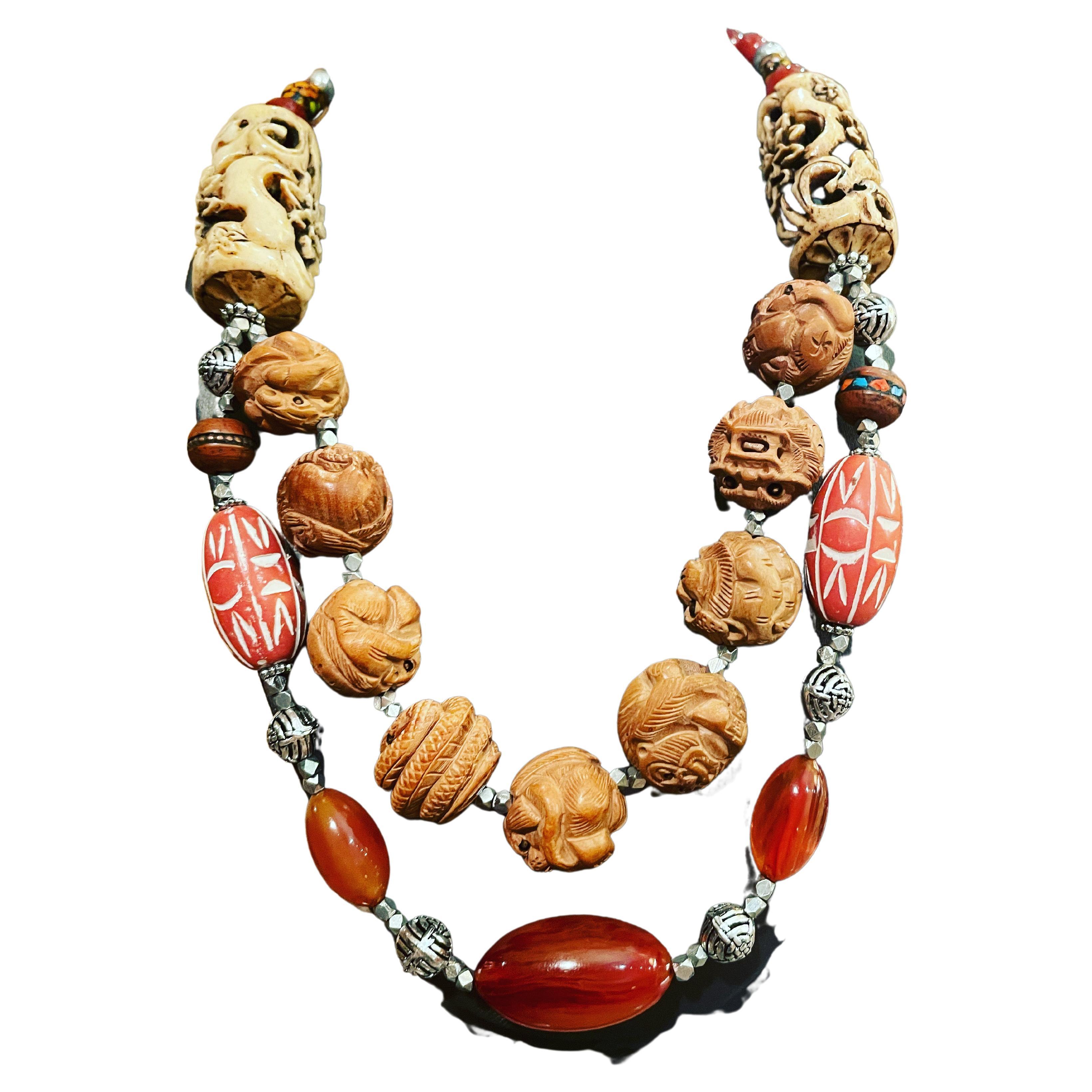 Vintage carved wooden Chinese beads, Bakelite, soapstone barrels, OOAK necklace. For Sale