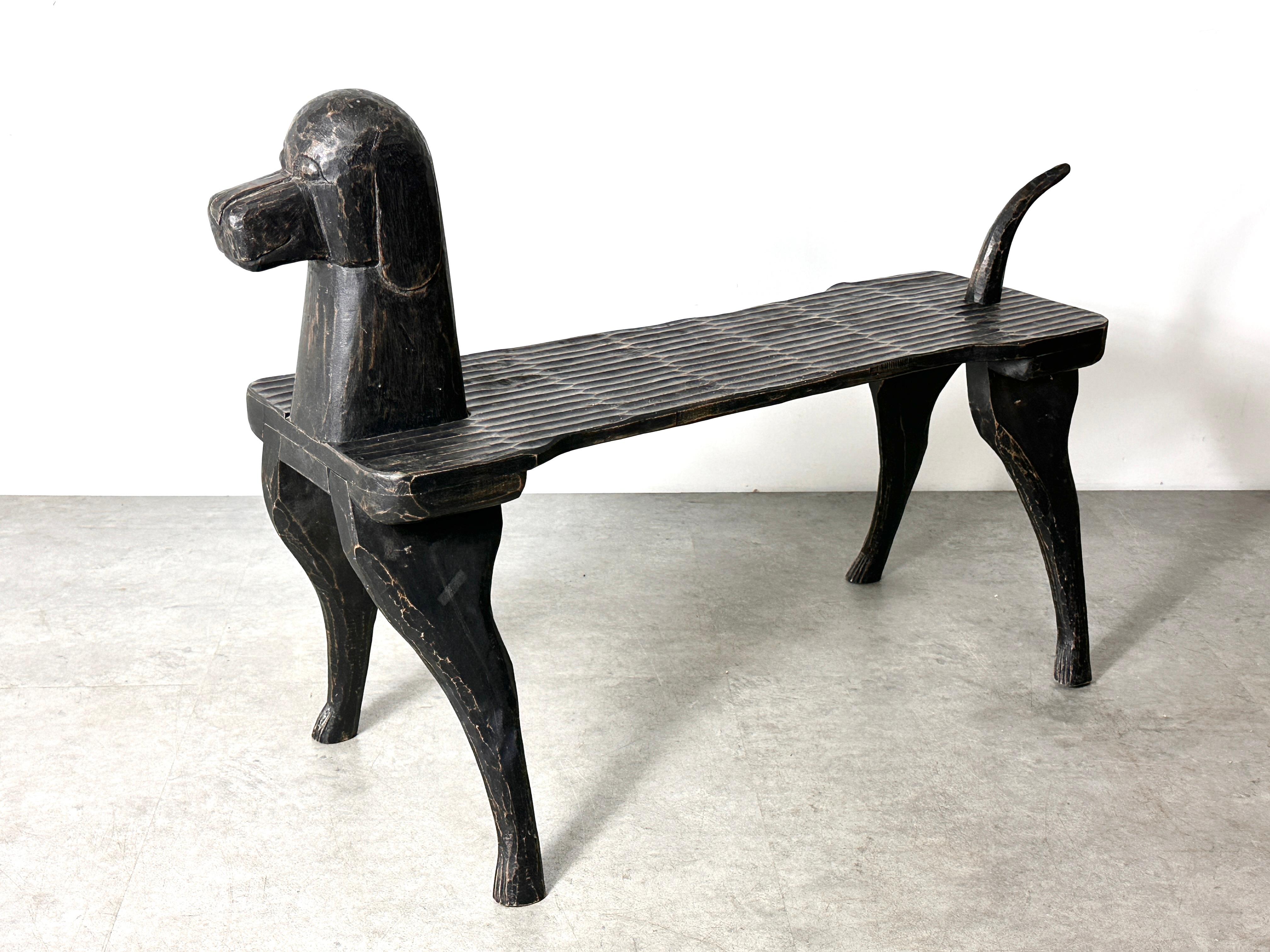 Sculptural carved wood dog form bench attributed to Steven Huneck circa 1990s
Post modern design in solid wood with carved details and distressed finish 
