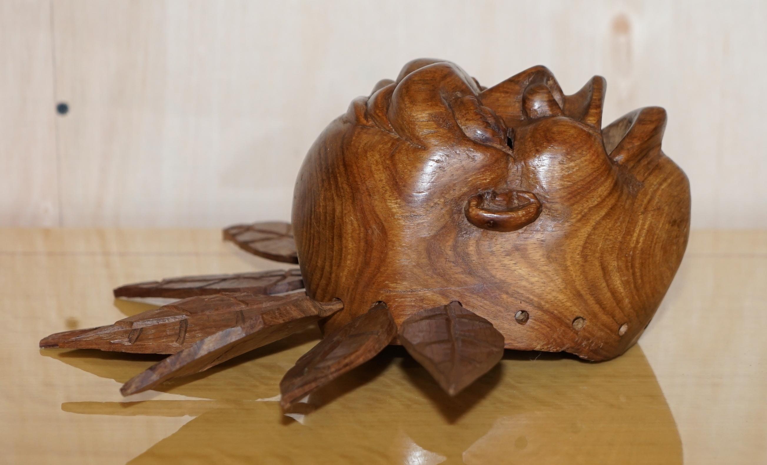 African Vintage Carved Wooden Head with Removable Feathers, Carved from Single Burr For Sale