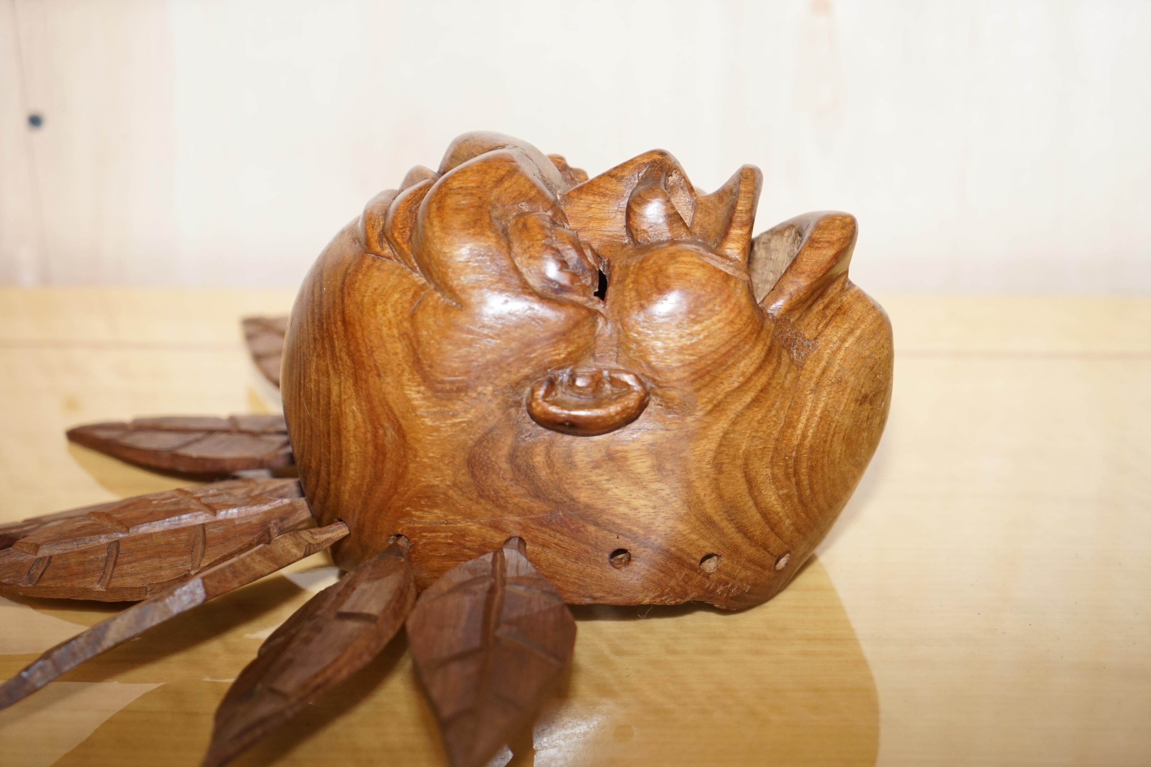 Hand-Crafted Vintage Carved Wooden Head with Removable Feathers, Carved from Single Burr For Sale