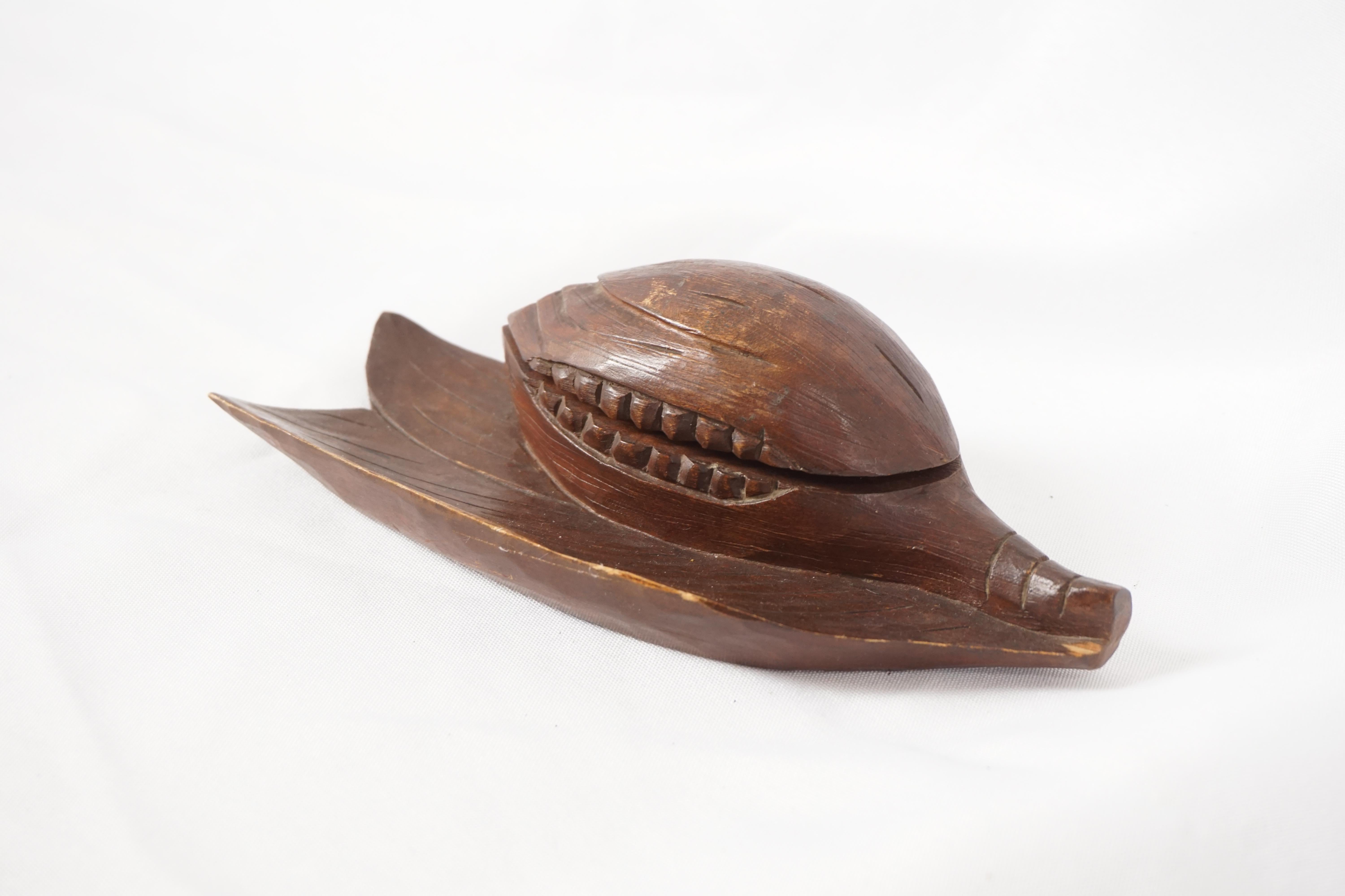 Vintage carved wooden inkwell, shape of a corn hush, European 1930, H307

European 1930
Wood
A carved wooden corn hush with lid top
Opens to reveal a single glass inkwell

H307

Measures: 6.75