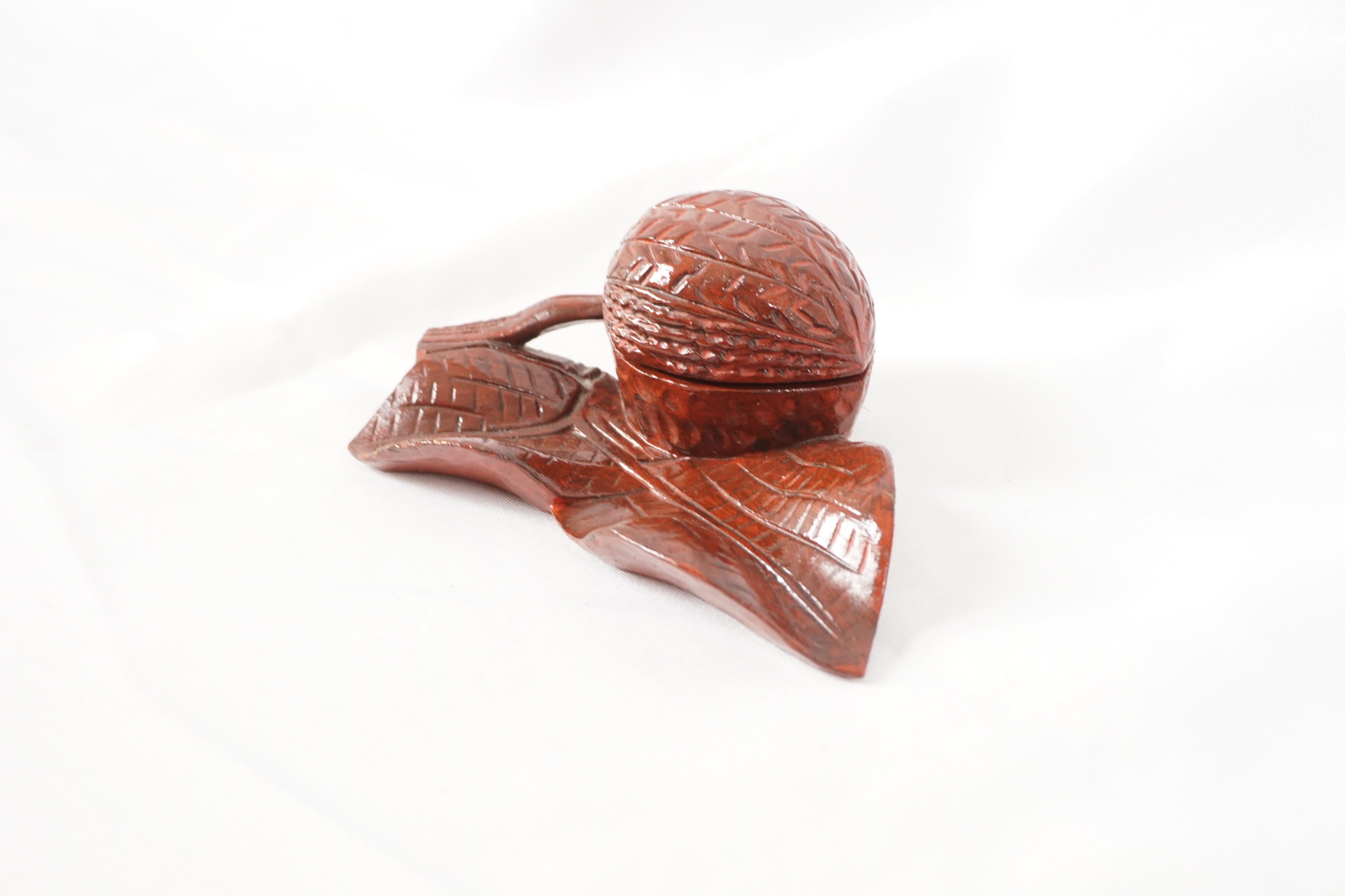 Vintage carved wooden inkwell, Shape Of A Nut, European 1930, H308

European 1930
Carved Wooden Nut With Leaf 
Top Lifts Up To Reveal A Single Glass Inkwell 
All Original 

H308

Measures: 5.5