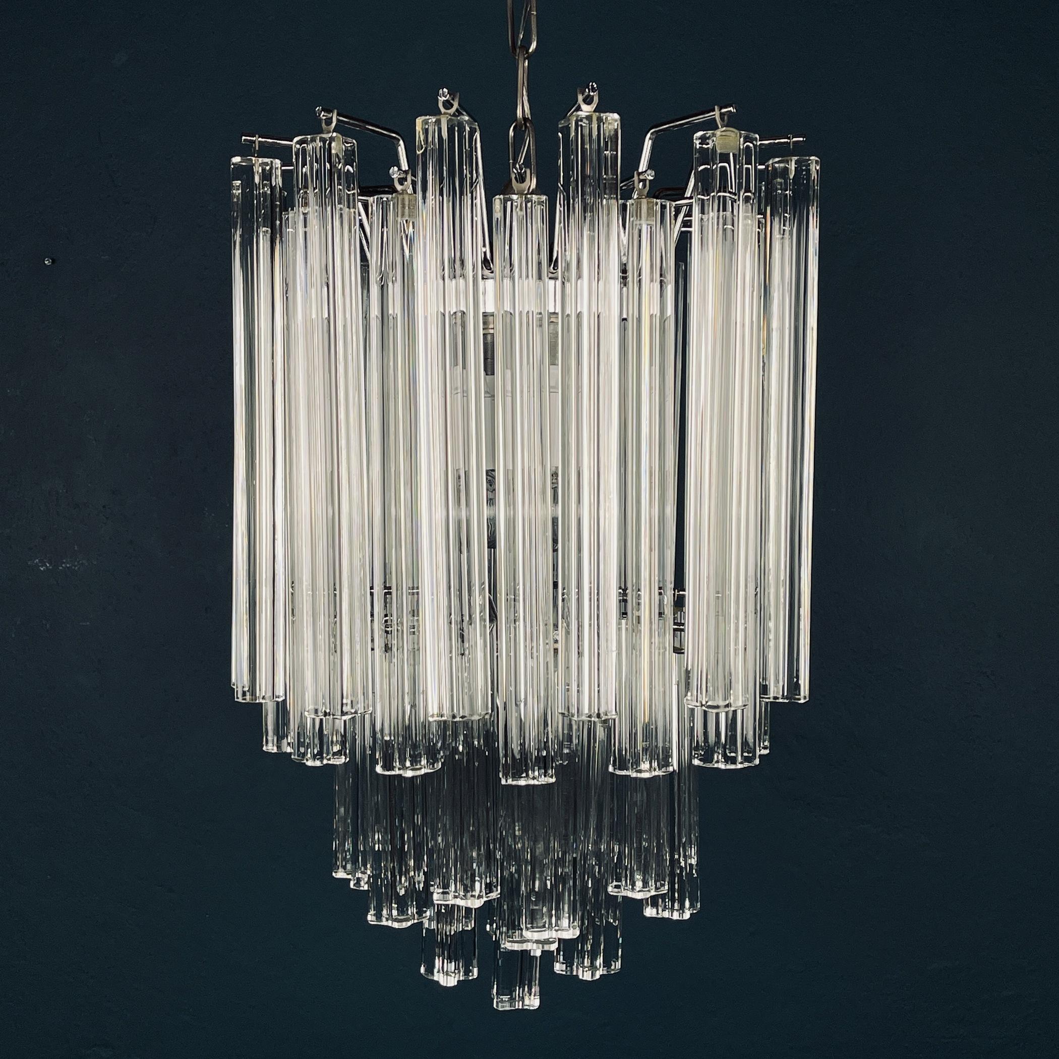 Stunning cascade chandelier made of 45 Murano glass transparent crystals by Venini. Made in Italy in the 1970s. The total height of the chandelier is 90 cm. The chandelier weighs 15 kg! Requires four E14 bulbs. The lamp is in very good condition.