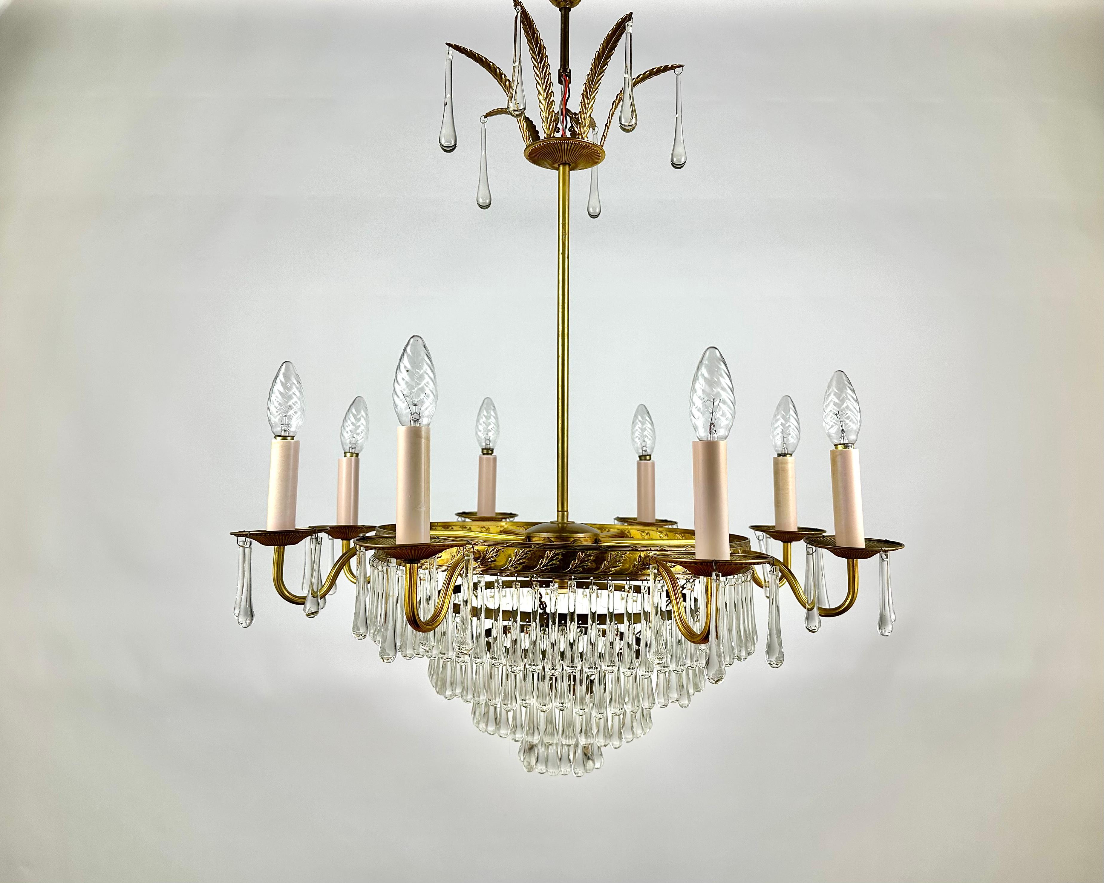 French Vintage Cascading Crystal And Brass Chandelier France 1960s For Sale