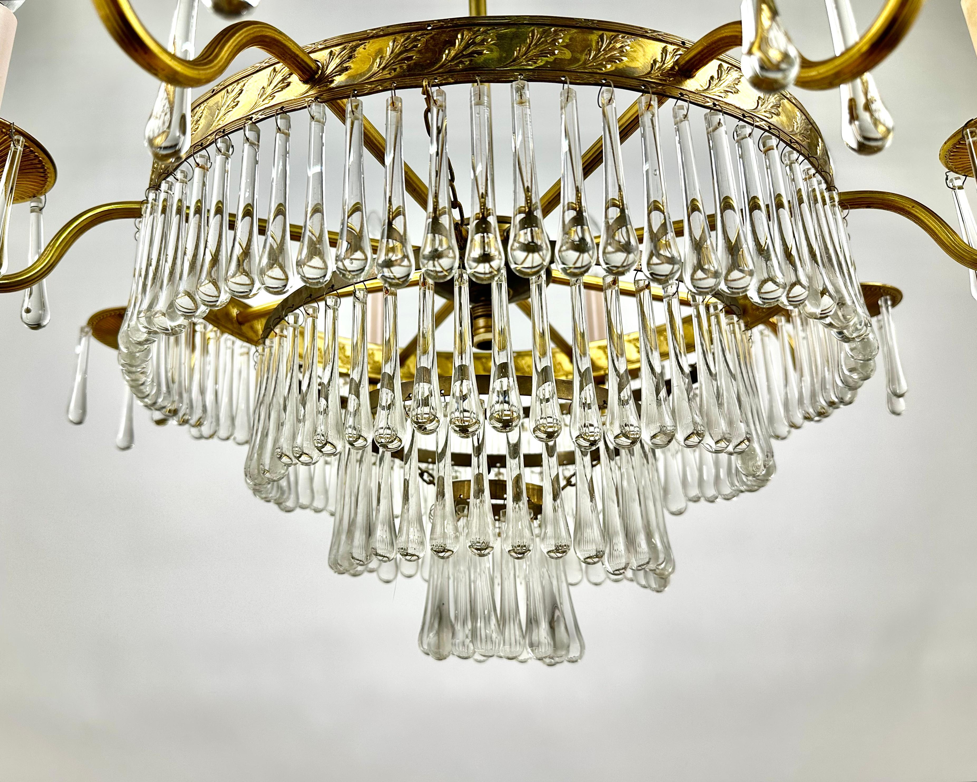 Vintage Cascading Crystal And Brass Chandelier France 1960s In Excellent Condition For Sale In Bastogne, BE