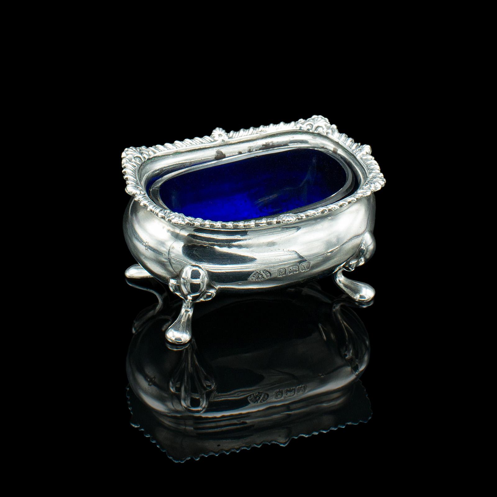 This is a vintage cased condiment set. An English, Sterling silver and cobalt glass tableware case, dating to the mid 20th century, hallmarked 1948.

Add a dash of silver to the dinner table with this appealing set
Displaying a desirable aged patina
