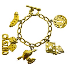 Vintage casino gambler gold tone designer charm bracelet