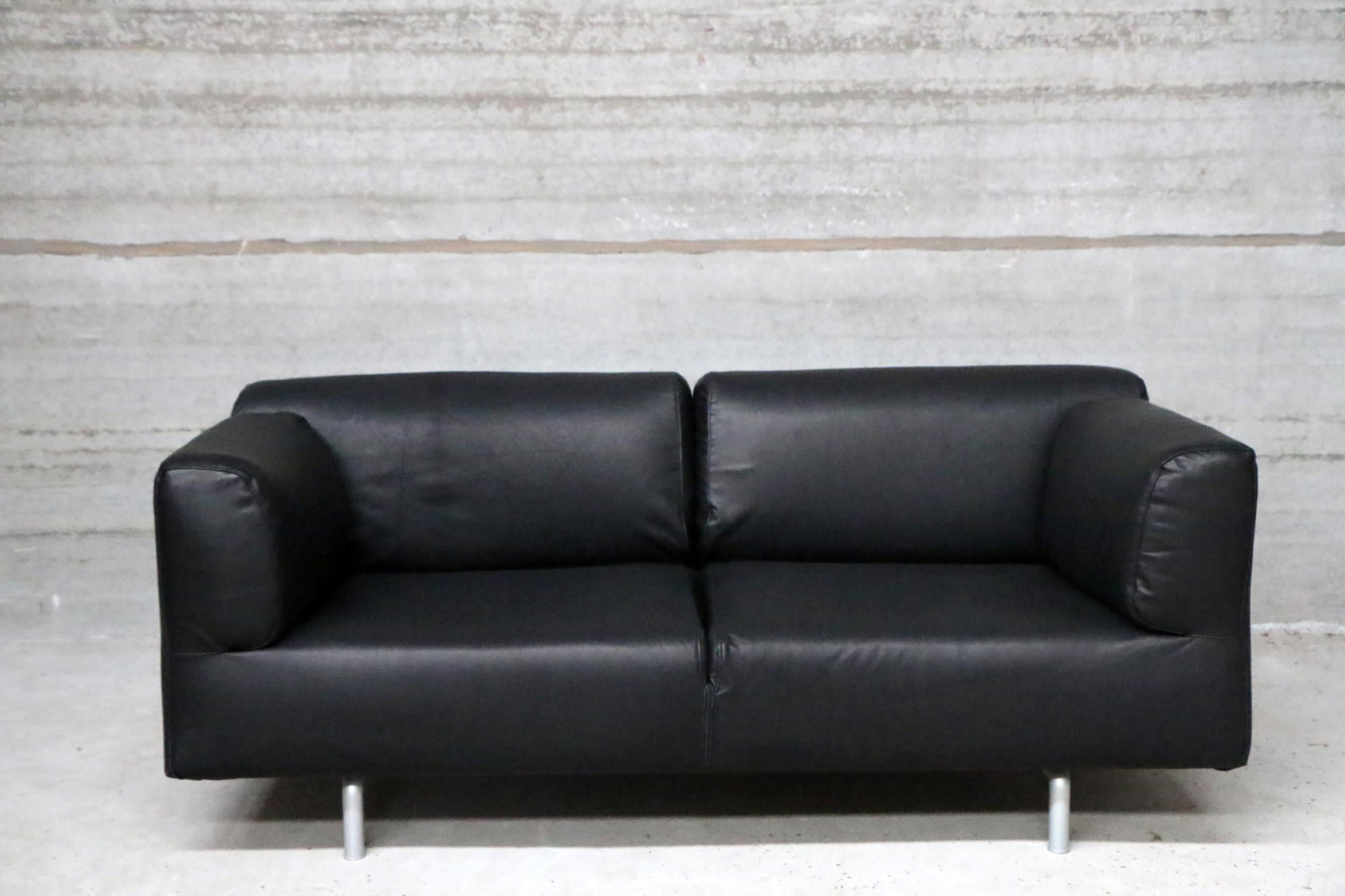 Re-upholstered in full grain black leather by funky vintage Belgium. Very elegant design and high seating comfort. Foam in excellent condition.