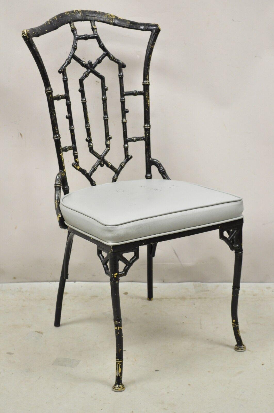 Vintage Cast Aluminum Faux Bamboo Black Painted Dining Chairs - Set of 4. Item features cast aluminum frames, distressed finish, very nice vintage set, great style and form. Circa Mid to Late 20th Century. Measurements: 38