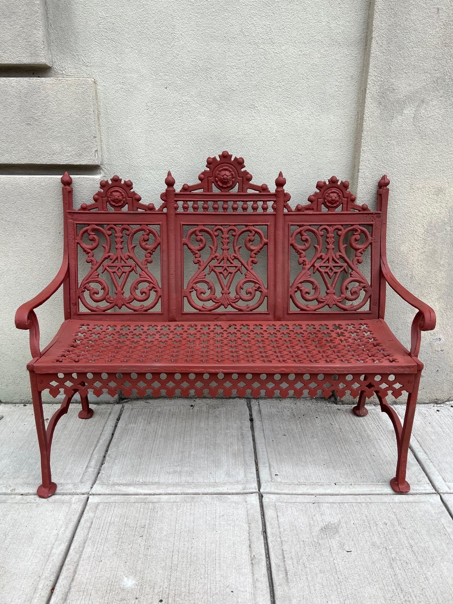Vintage cast aluminum garden bench in the style of the William Adams Foundry Philadelphia PA. William Adams opened his foundry in 1903 in Northern Philadelphia known for its diminutive Renaissance style garden pieces. The bench is a good example of