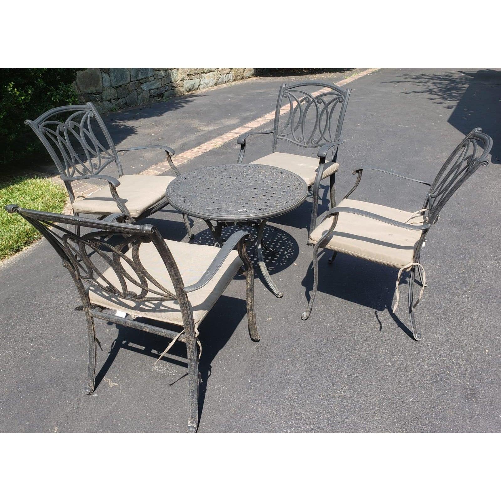 Vintage cast aluminum UV and rust resistent stackable patio armchairs with cushions and table set with cushions. Frame very durable, Water resistent; UV resistant; Resistant and rust resistant. 
Good vintage condition. Generous size 24W x 24D x